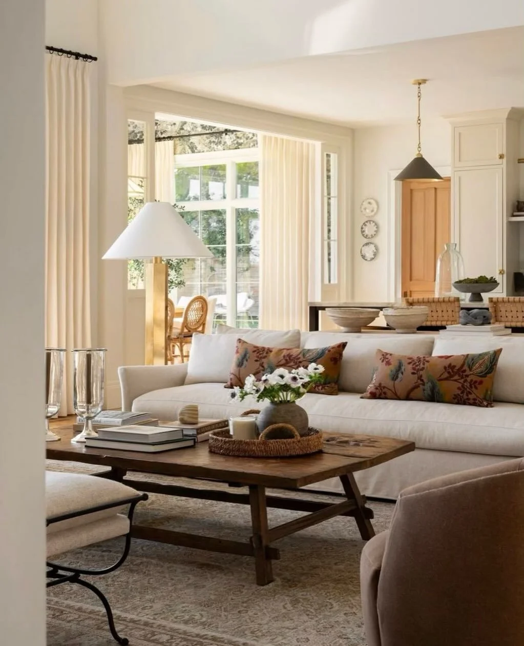✨ Inspiration ✨ Todays share is a beautiful open concept living room by @studiomcgee. We&rsquo;re forever inspired by their modern take on traditional furnishings. The addition of a rustic table in this setting brings plenty of charm while the floral