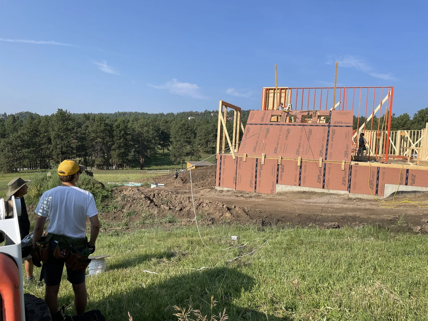 Wall framing going up on a new foundation