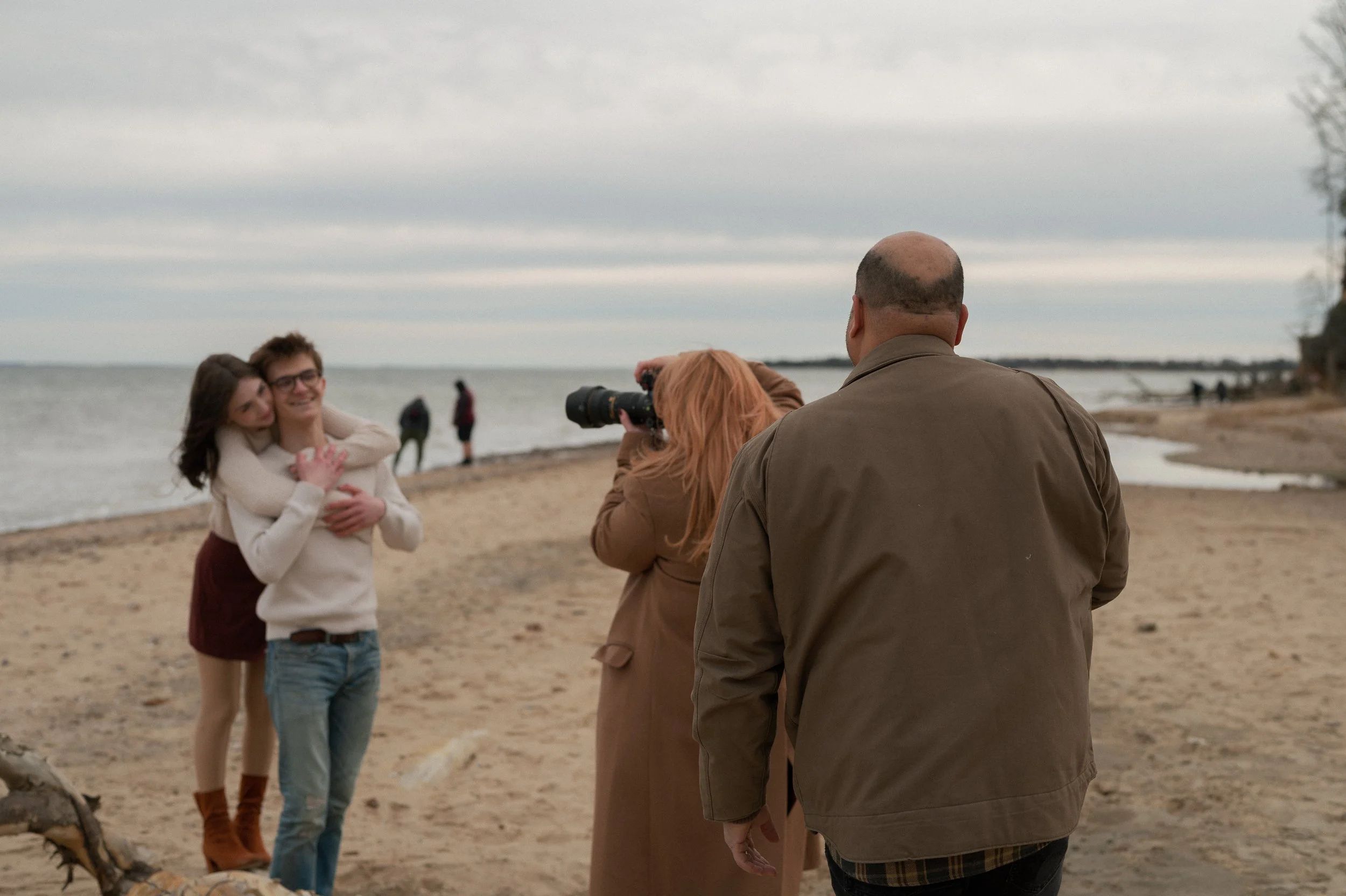 Nicole Olea photograph’s a couple during a photo shoot at Calvert Cliffs State Park in Maryland.