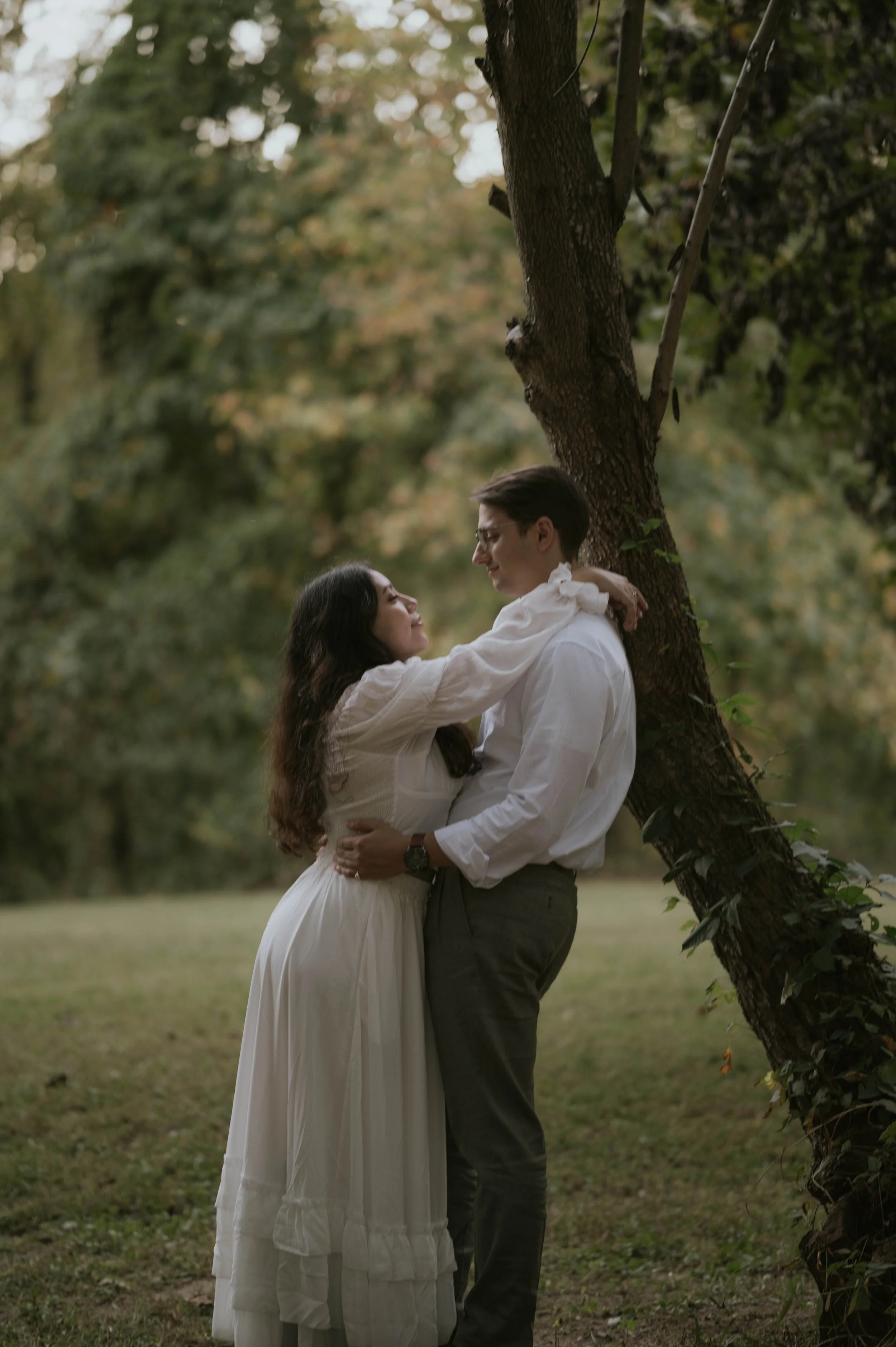 Couple embracing during a film-inspired engagement session  in Southern Maryland.