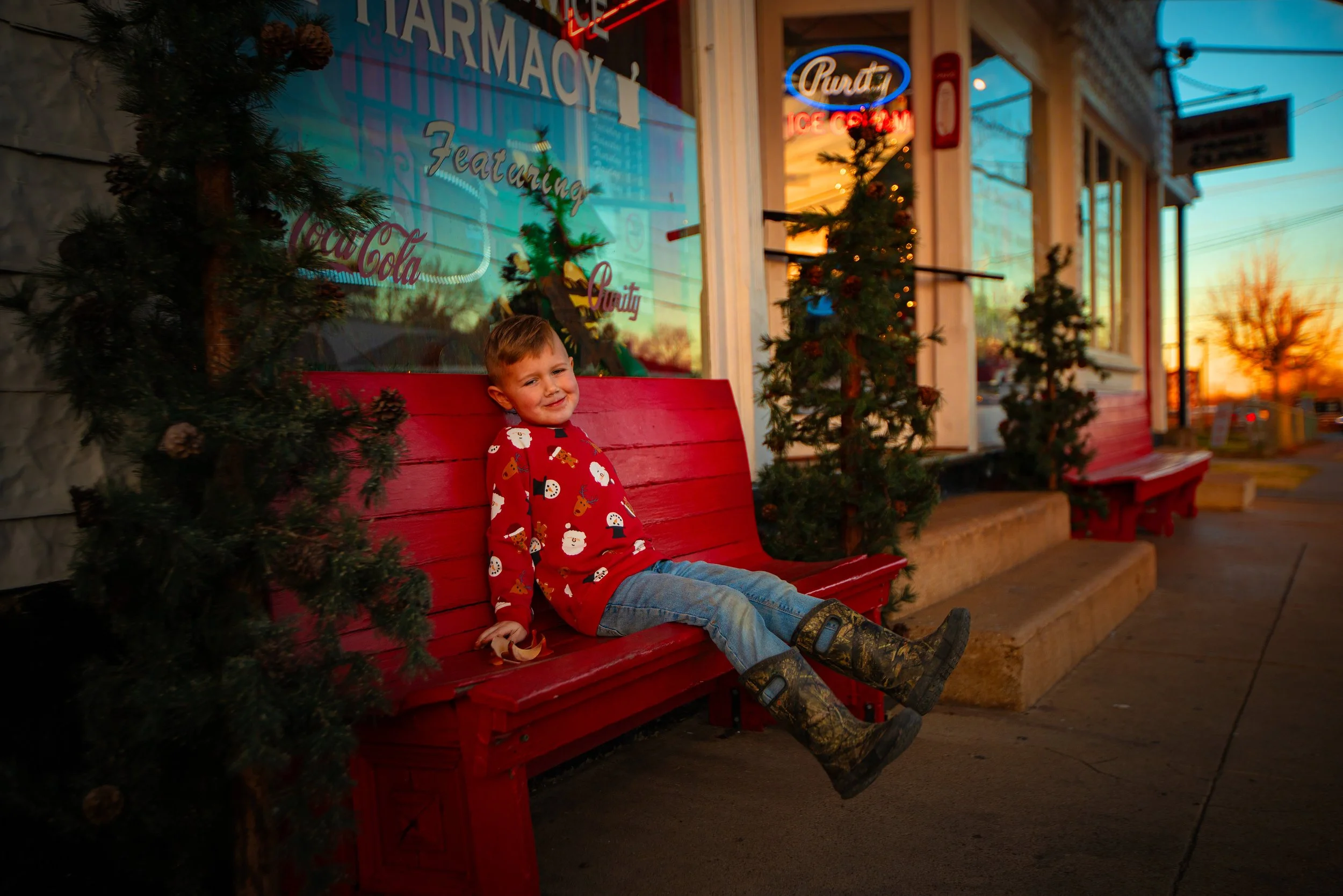 Wyatt-on-red-bench-old-store-cross-plains,-tn.jpg