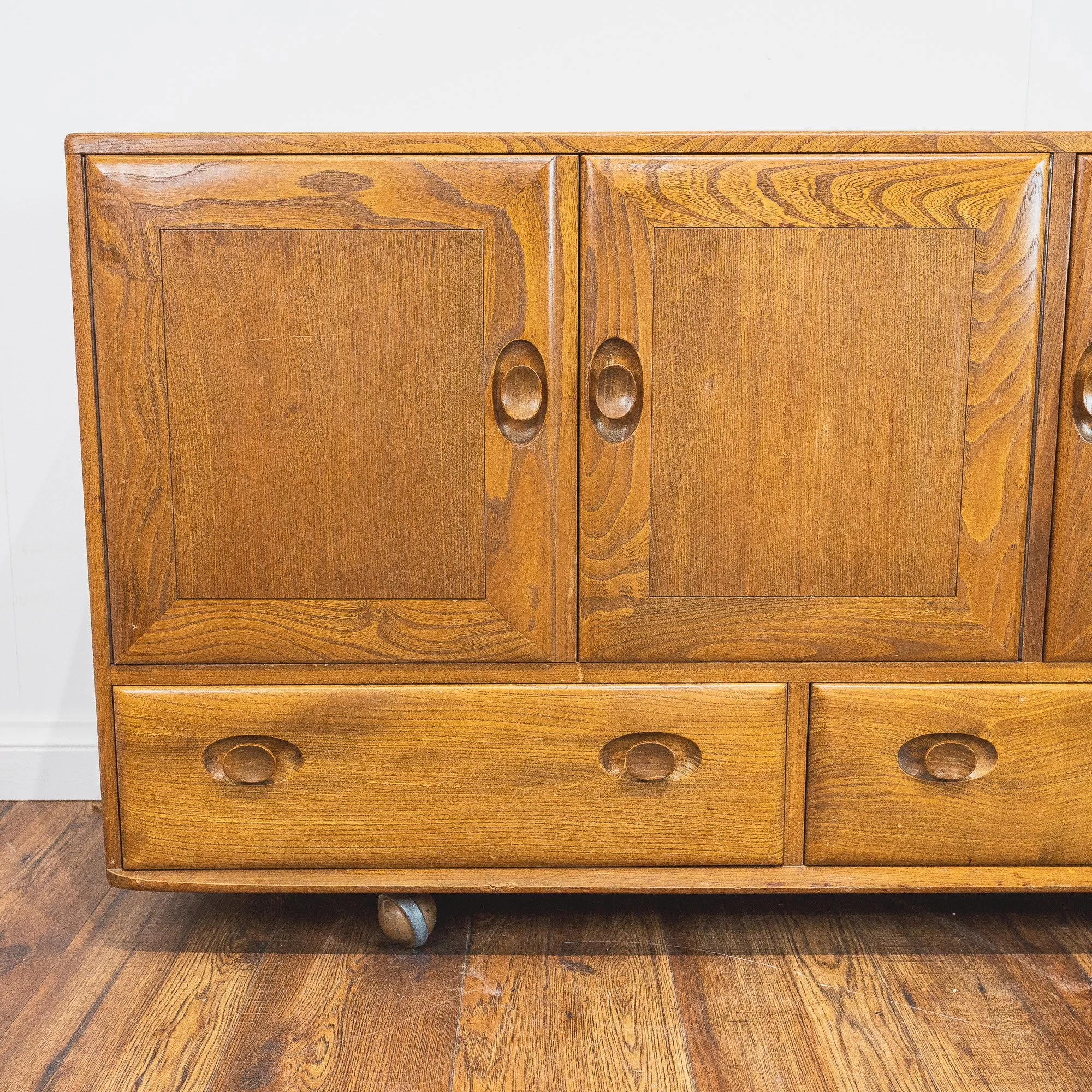 8 - Ercol Windsor Elm Model 468 Sideboard on wheeled castors -3.jpg
