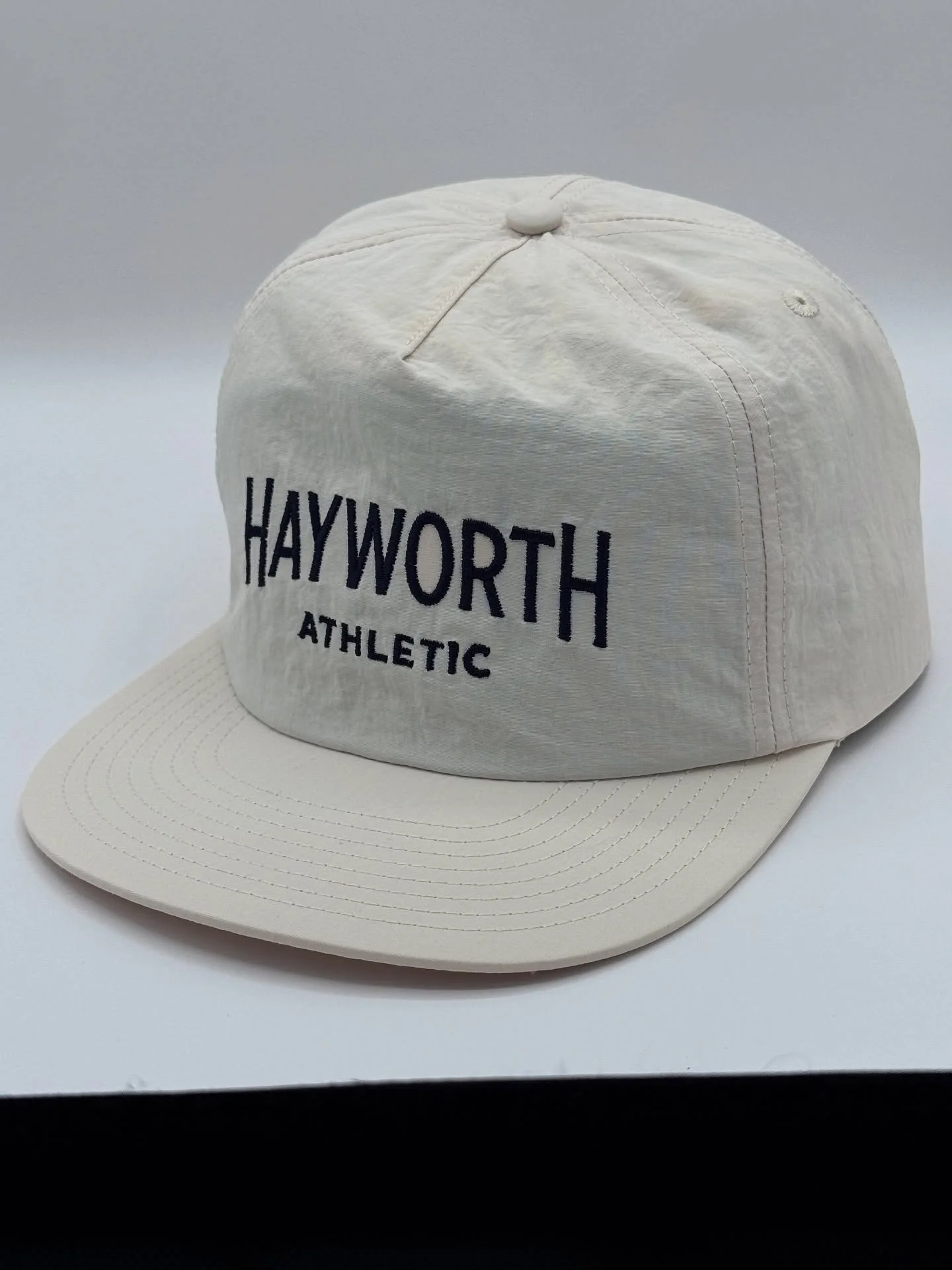 The new hats are on point. 100% nylon. $35.