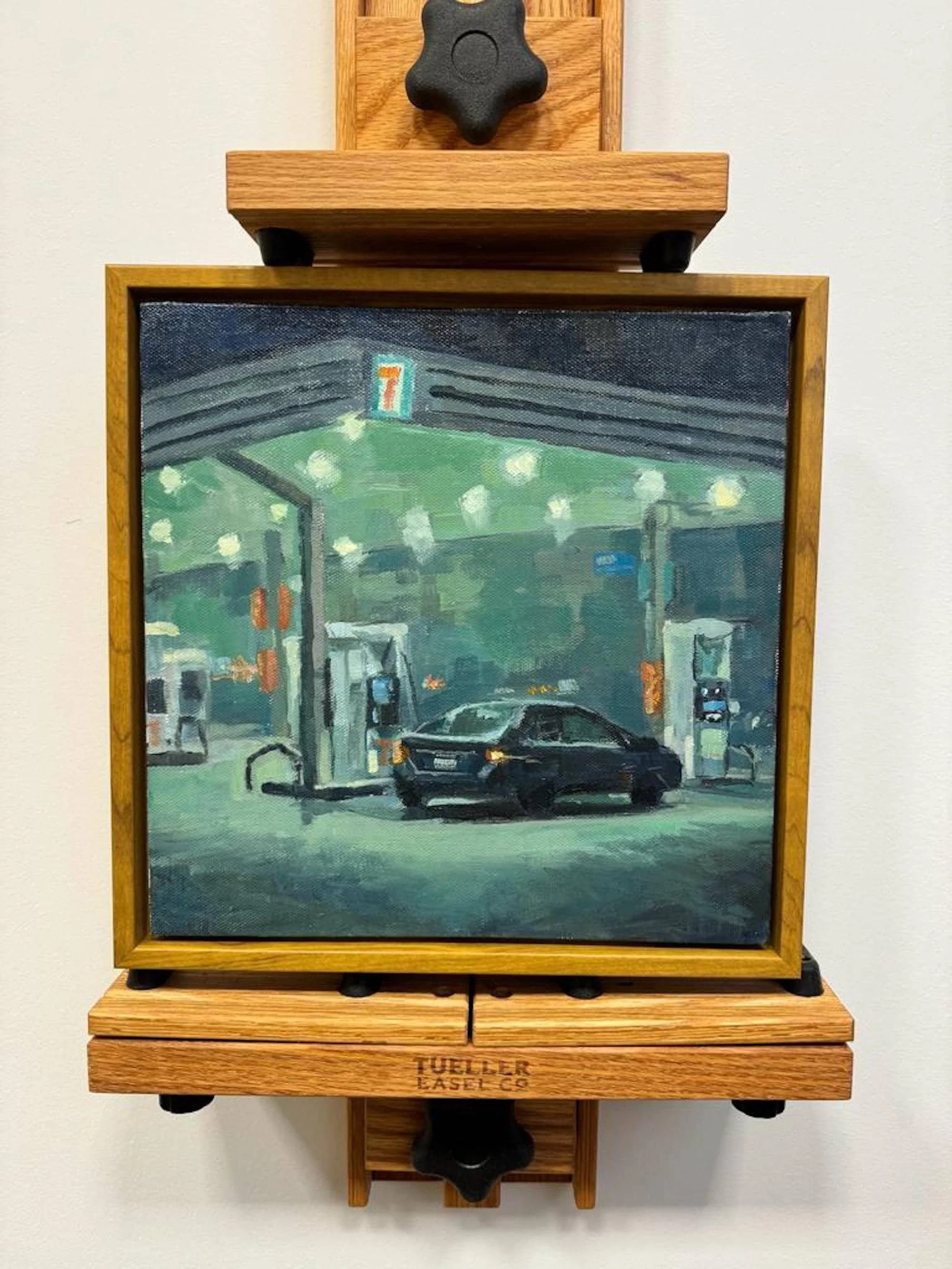 framed painting on the easle