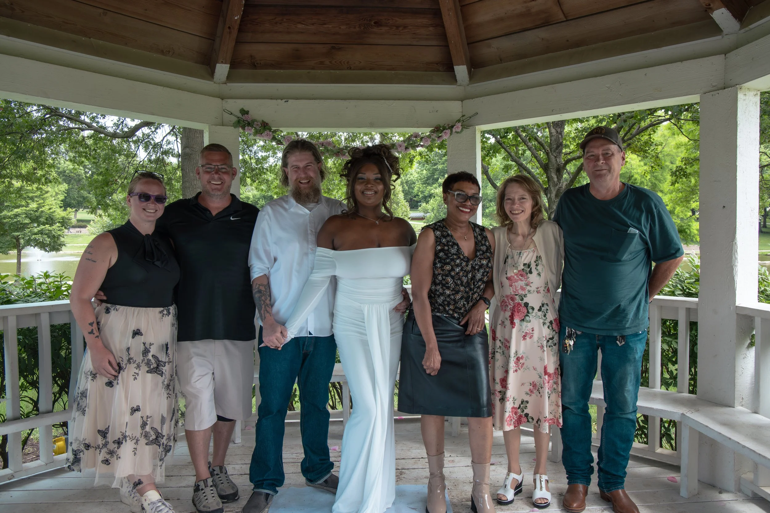 bride and groom with their guests after the ceremony