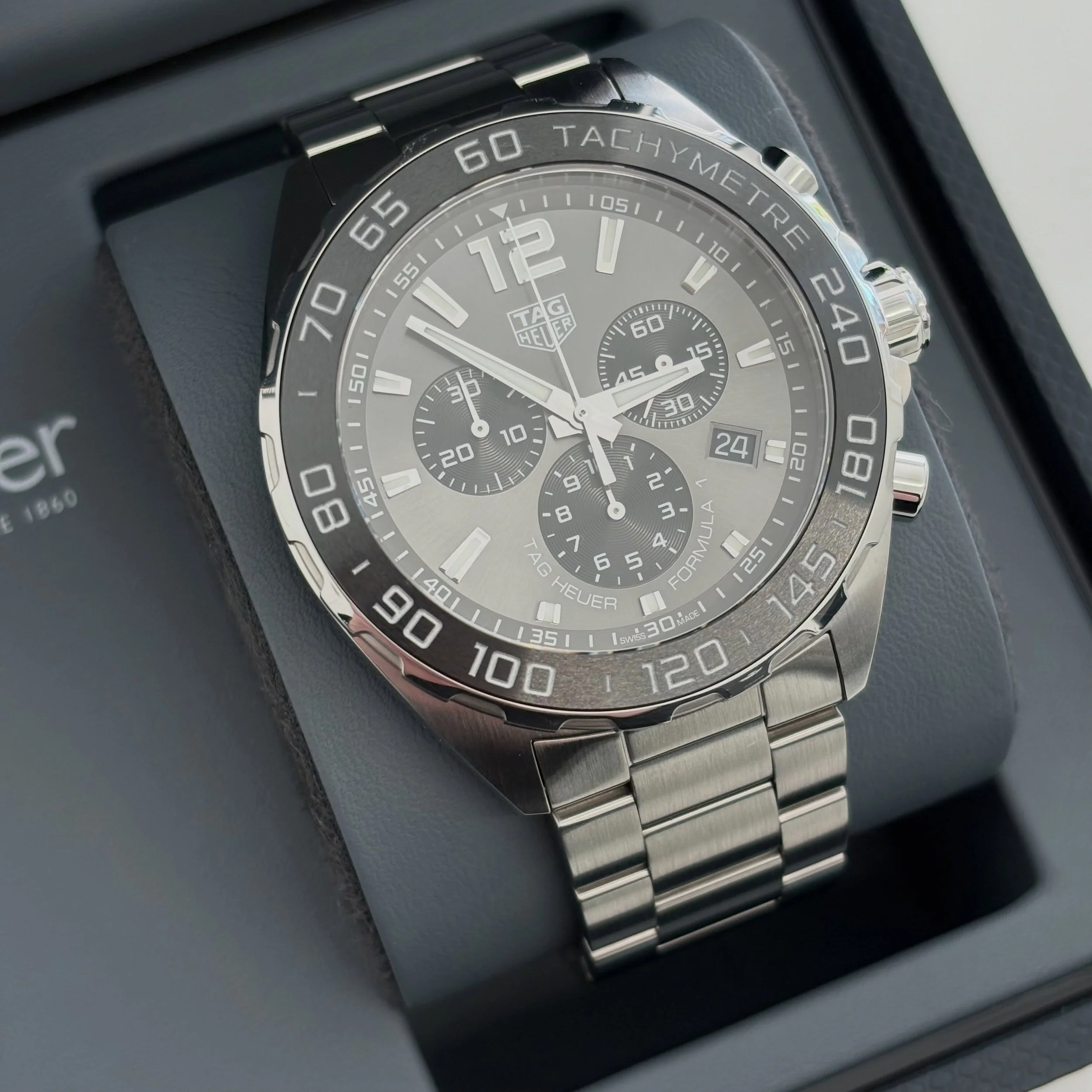 &pound;1100 💸

Tag Heuer Formula 1
Model CAZ1011
Year 2024
Grey Chronograph Dial
Quartz movement
Stainless Steel Bracelet
43mm Stainless Steel Case
Steel bezel with a Black Ceramic insert

Watch, box, booklet and warranty card
Case and bracelet poli