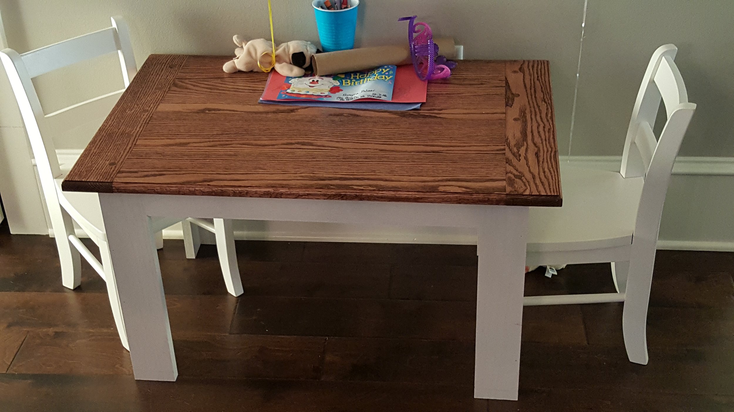 Children's play table, red oak with bread board ends to match dining table.