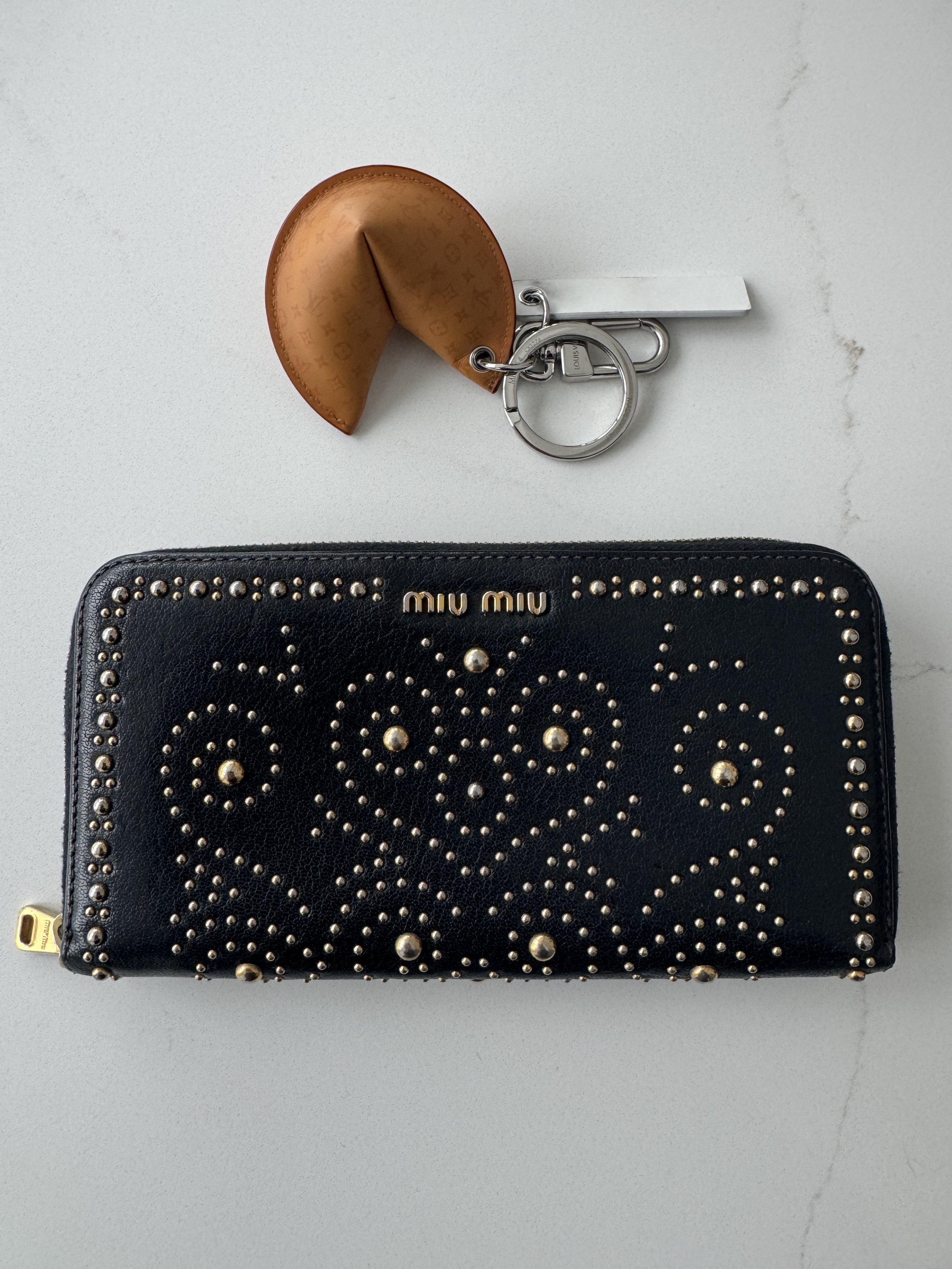 Miu Miu Zippered Wallet with gold embellishments