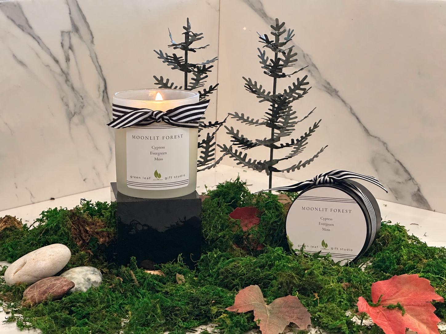 Frosted candle with striped ribbon(2).png