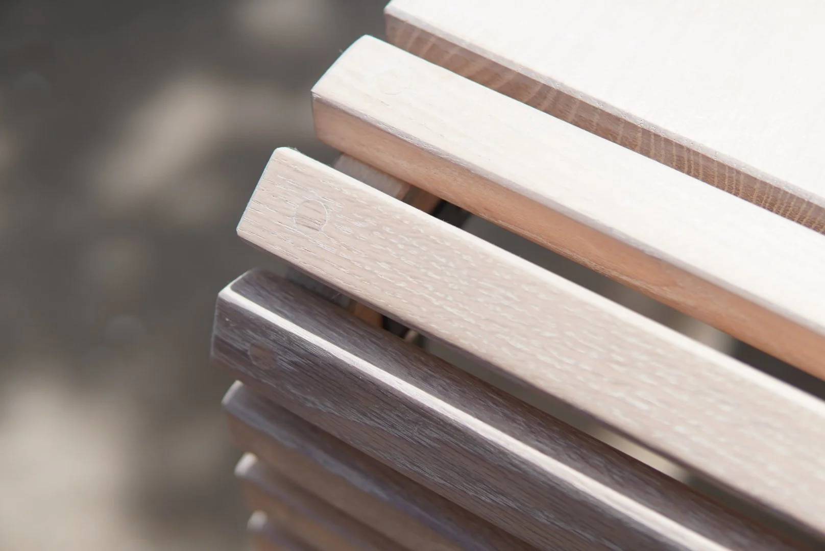 Close-up of oak wooden slats on custom furniture.