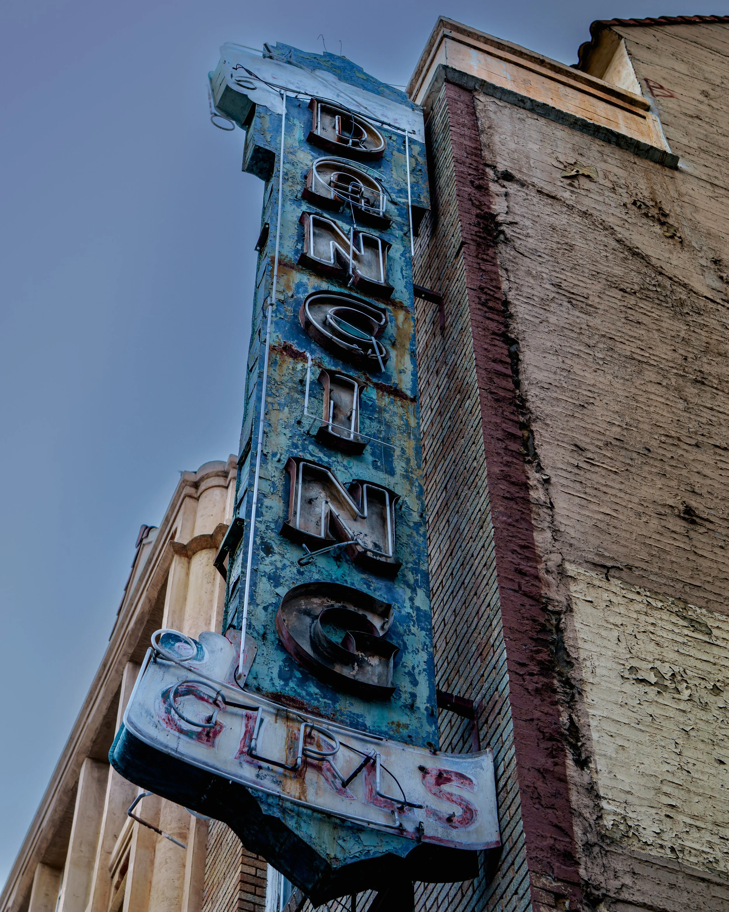 Old neon sign from the 1940's in Downtown Los Angeles featuring Dancing Grils 