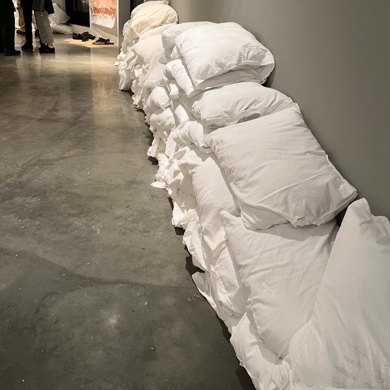 &ldquo;Deluge/Sions,&rdquo; 2024, Ellyn Weiss and Sondra N. Arkin, t-shirts &amp; pillows, size variable

Disembodied torsos represent the rising tide of those uprooted by environmental disasters and forced to seek precarious refuge in unfamiliar la