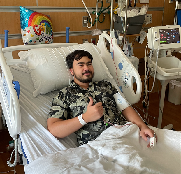 Young man receiving a bone marrow transplant