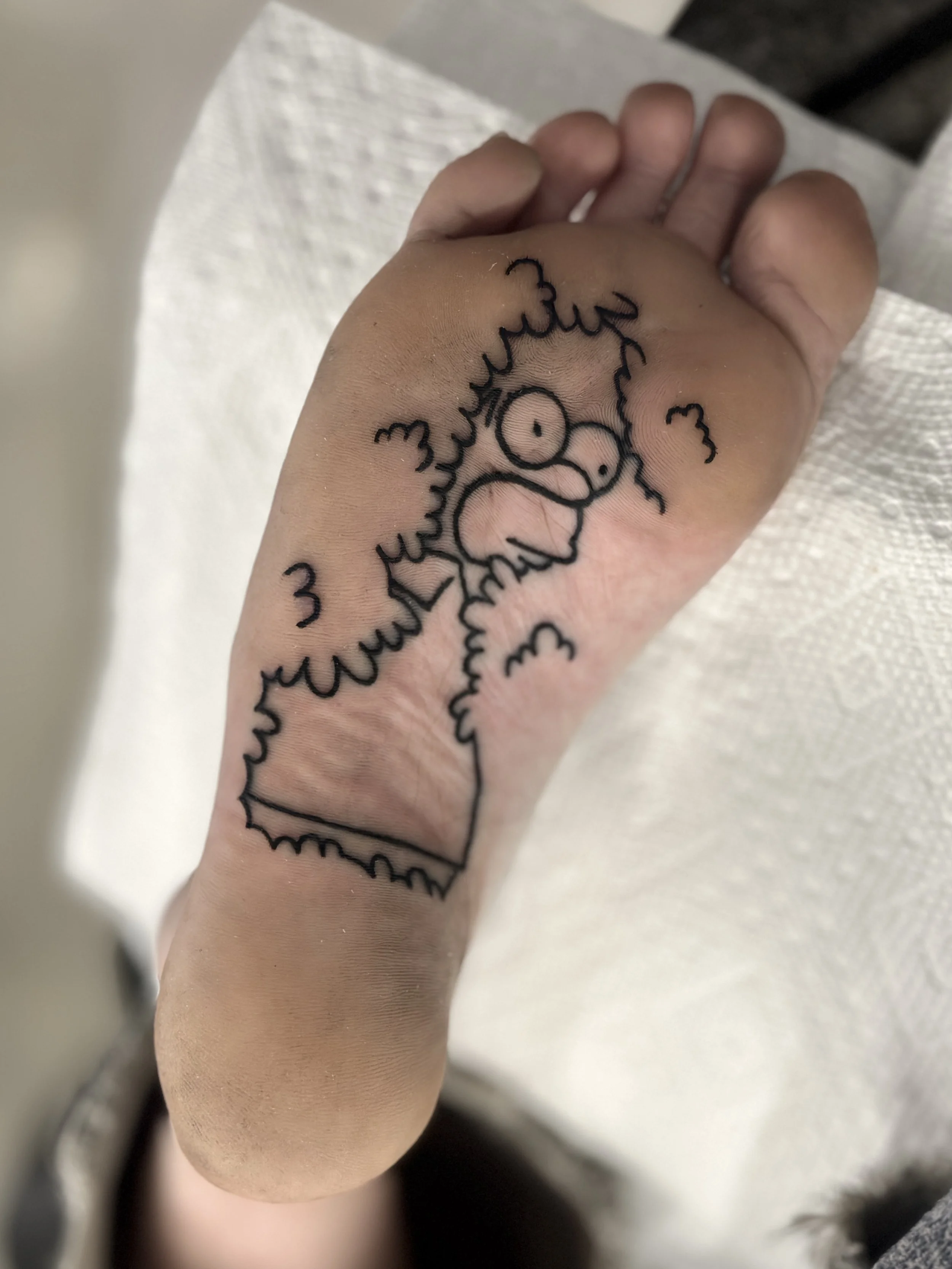 The Simpsons Homer bush meme bottom of foot sole tattoo