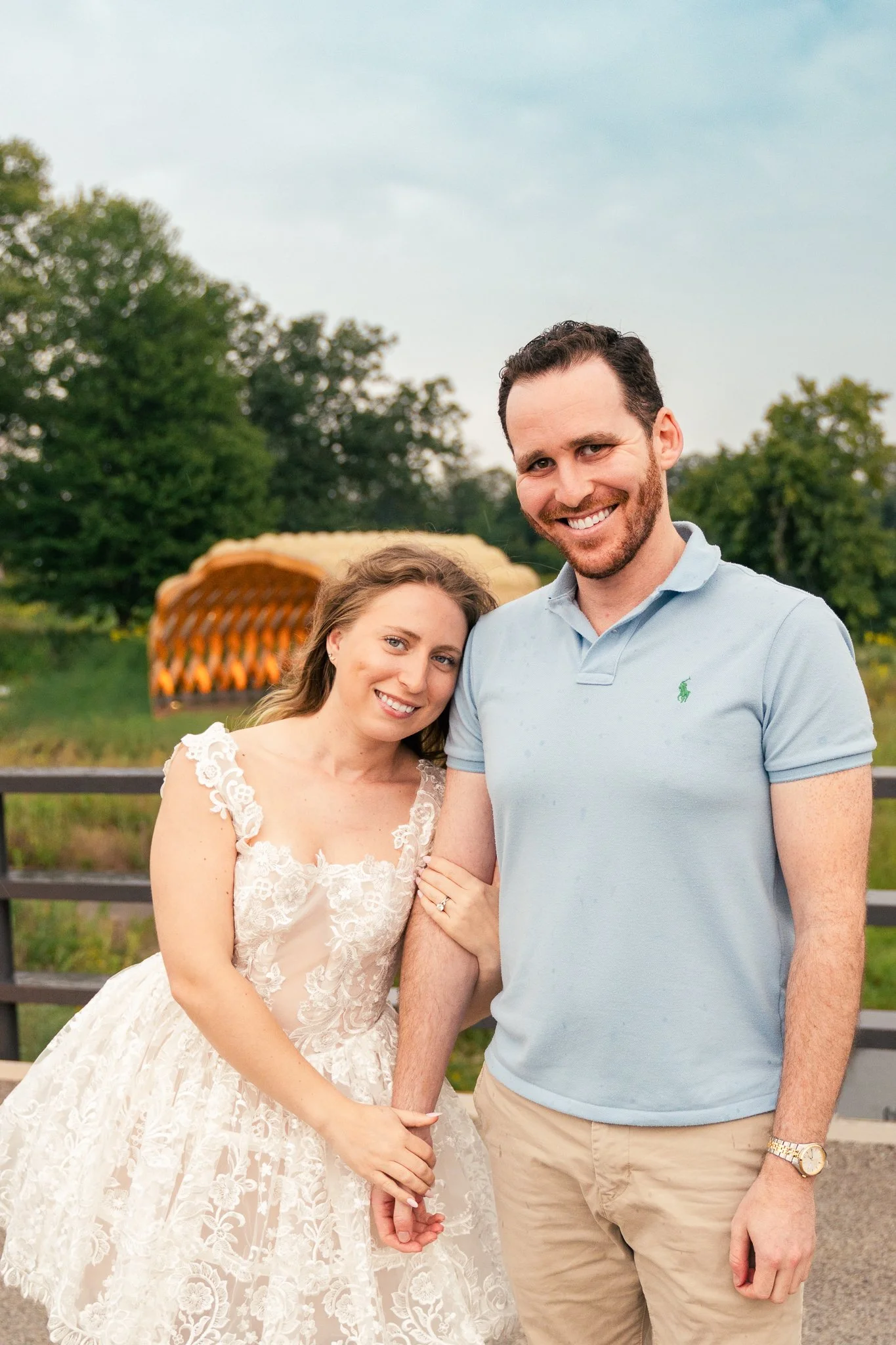 Lincoln Park Chicago Illinois Engagement Photographer | Bride in lace white dress holding on to grooms arm, Honeycomb in background | Midwest Wedding and Engagement Photography Sessions