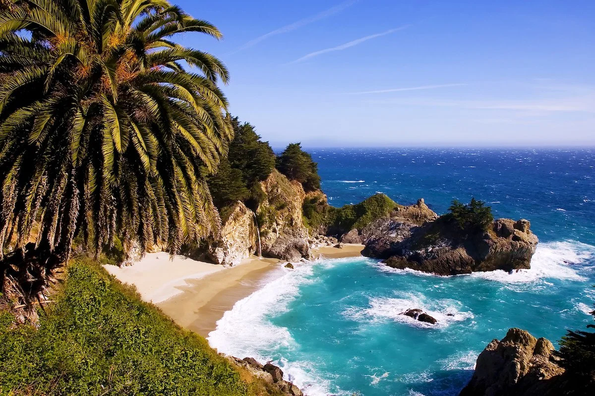 McWay Falls cascading onto the Big Sur coastline in California.