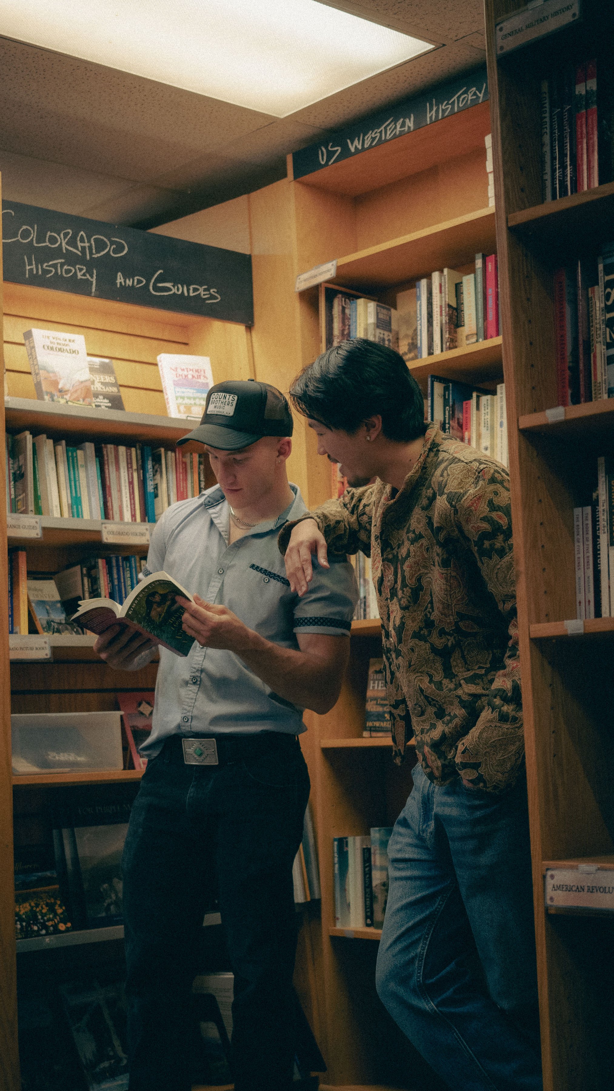 Lochlain teaching me how to read - Bookstore Girl Photoshoot