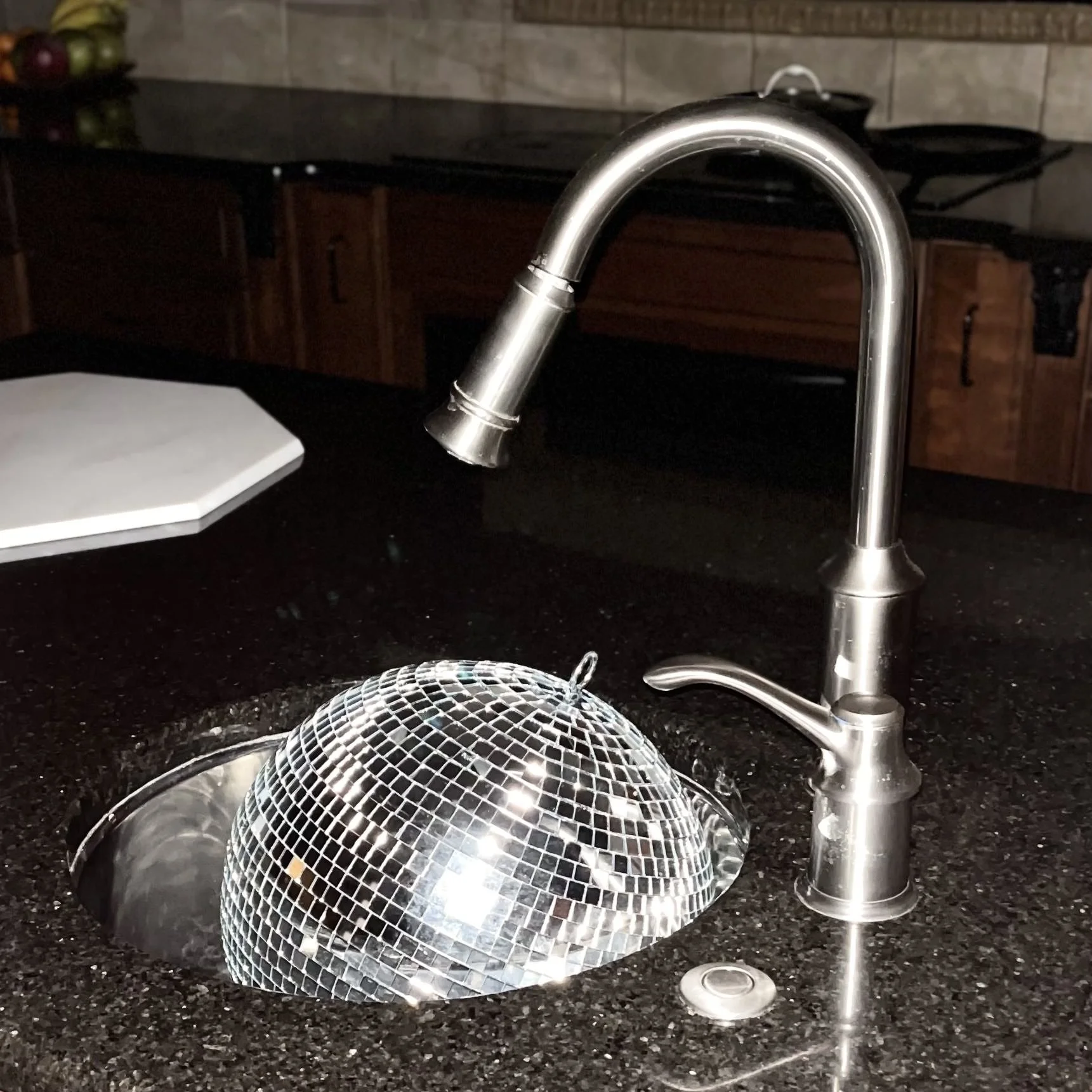 For Kitchen Sink, I just went to random sinks and took a bunch of photos of this disco ball - Kitchen Sink Photoshoot
