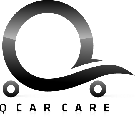 A stylized logo resembling a shopping cart with a circular element, in black and white.
