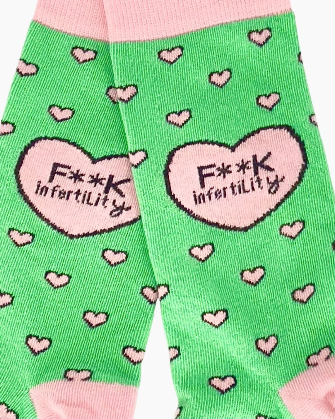 green and pink lucky IVF socks with knitted heart design