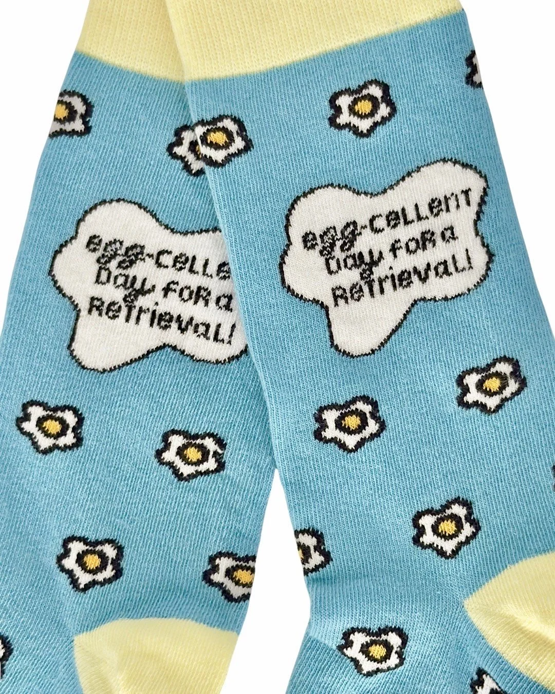 blue and yellow lucky egg retrieval socks with knitted egg design