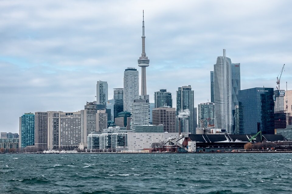 Toronto's skyline serenades the senses with a harmonious blend of modern marvels and timeless titans. The CN Tower, a maestro of metal, conducts an orchestra of angles, its reflection rippling across the glassy score of the lake below. 🇨🇦
.
.
.
.
.