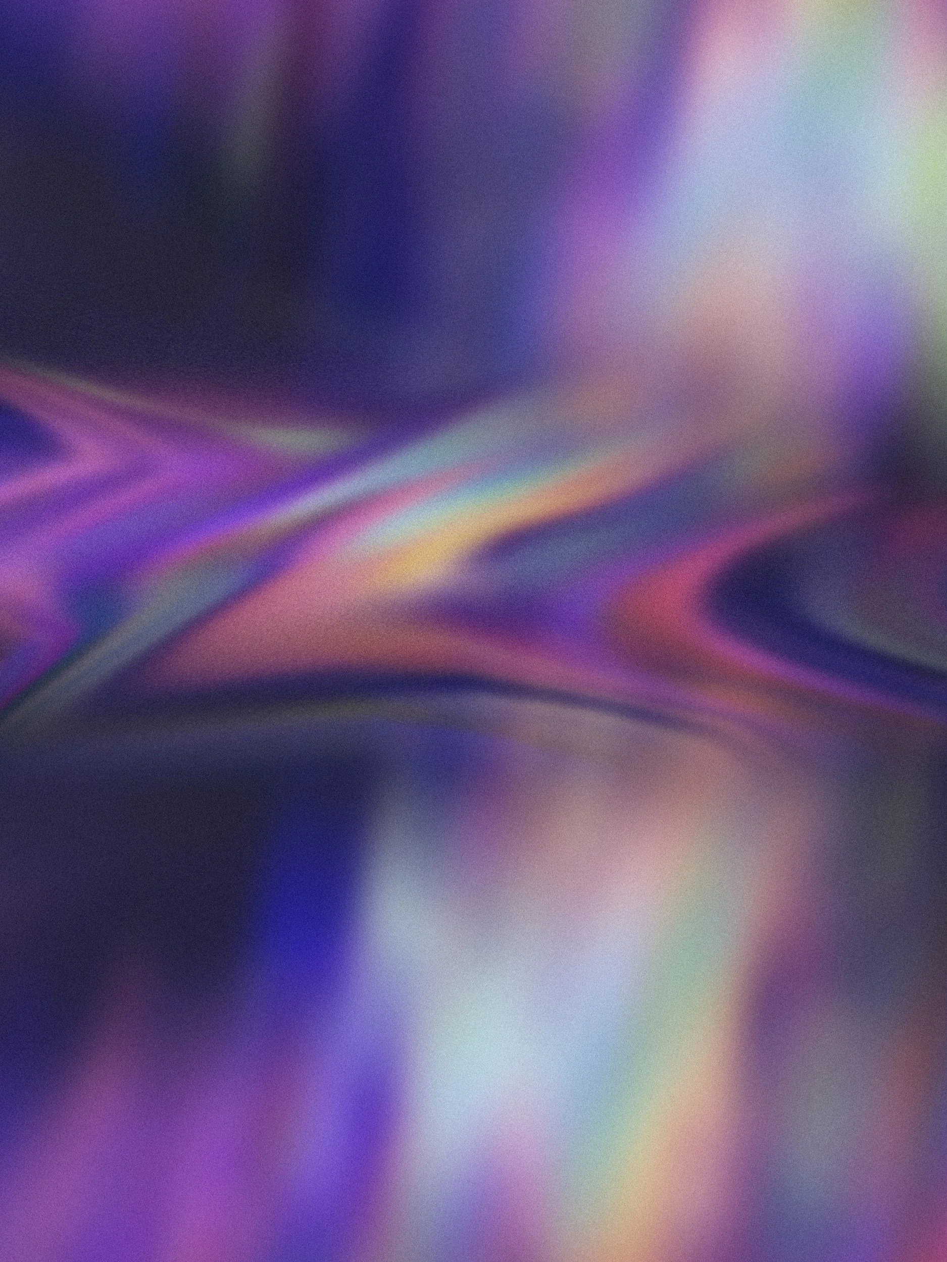 Abstract image with swirling colors including purple, pink, blue, and green.