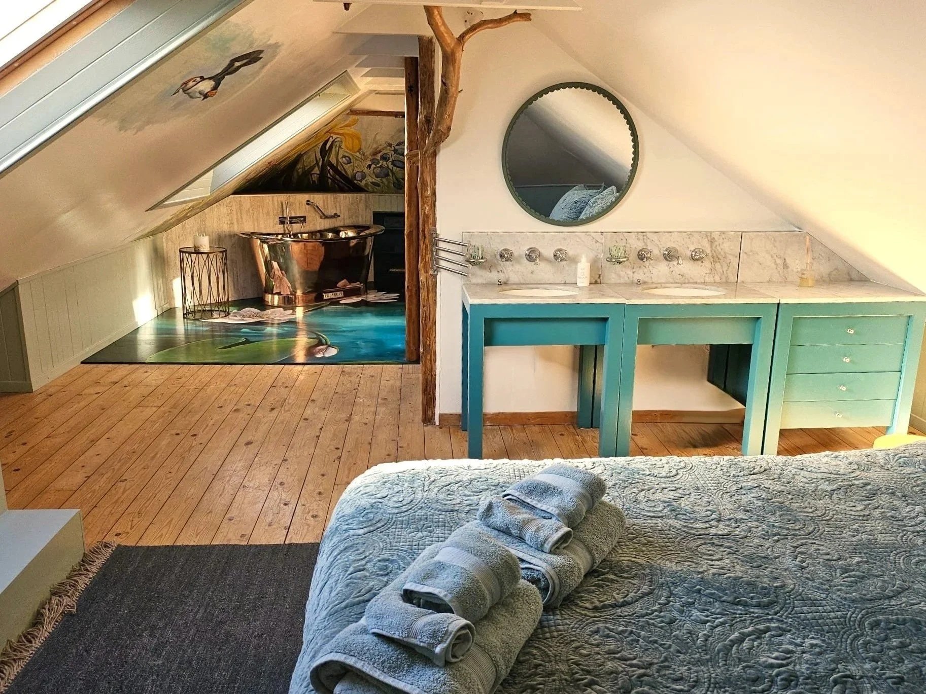 The 1st floor 'waterlily' king suite, with double marble topped vanity, William Holland copper bath, sauna and walk in power shower