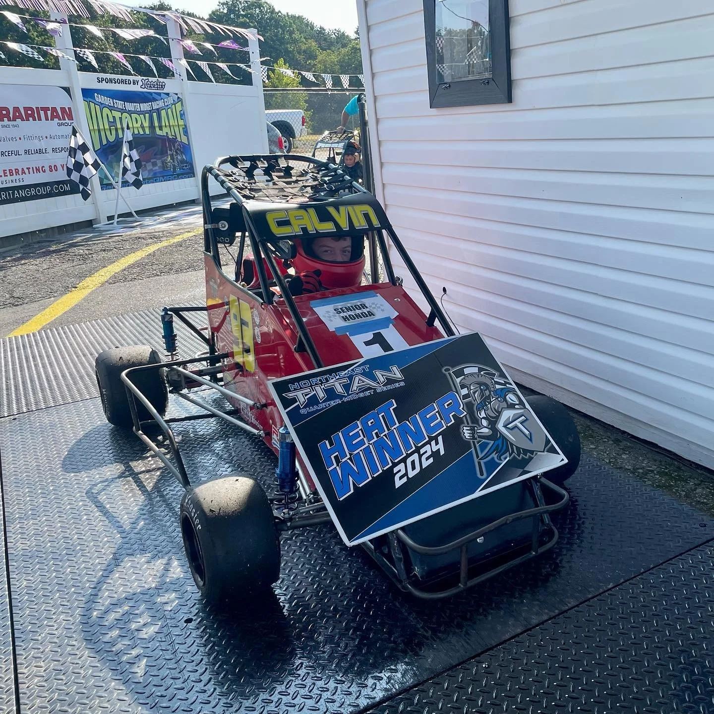 Off to a good start! Successfully defended position 1 in his heat and moving up to the A Main in Sr. Honda.  Wooooohooo!