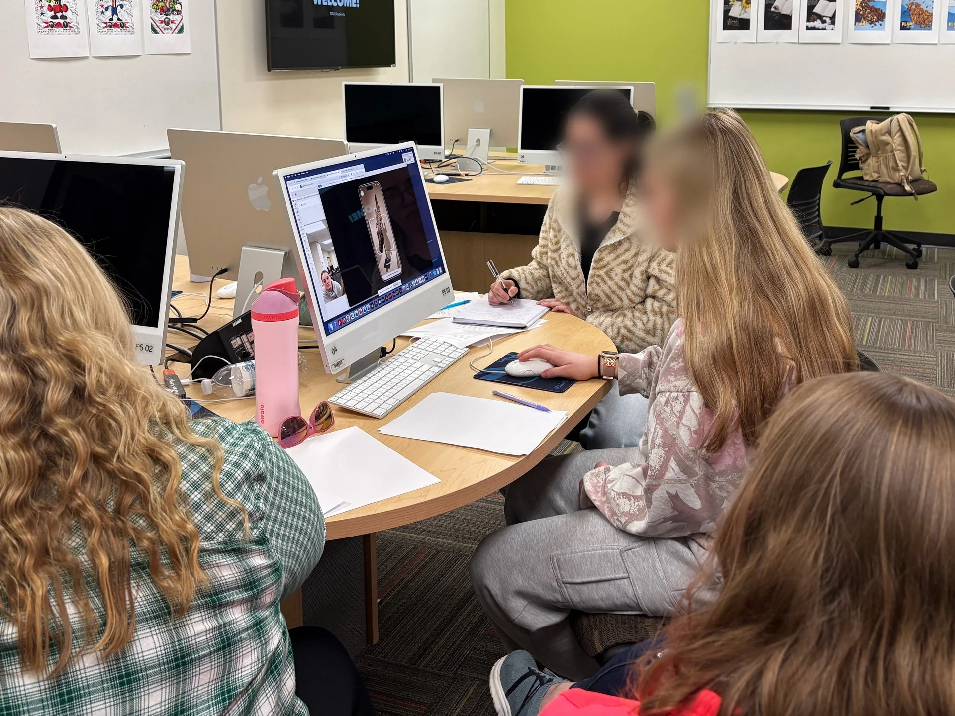 Students performing accessibility testing on app prototypes