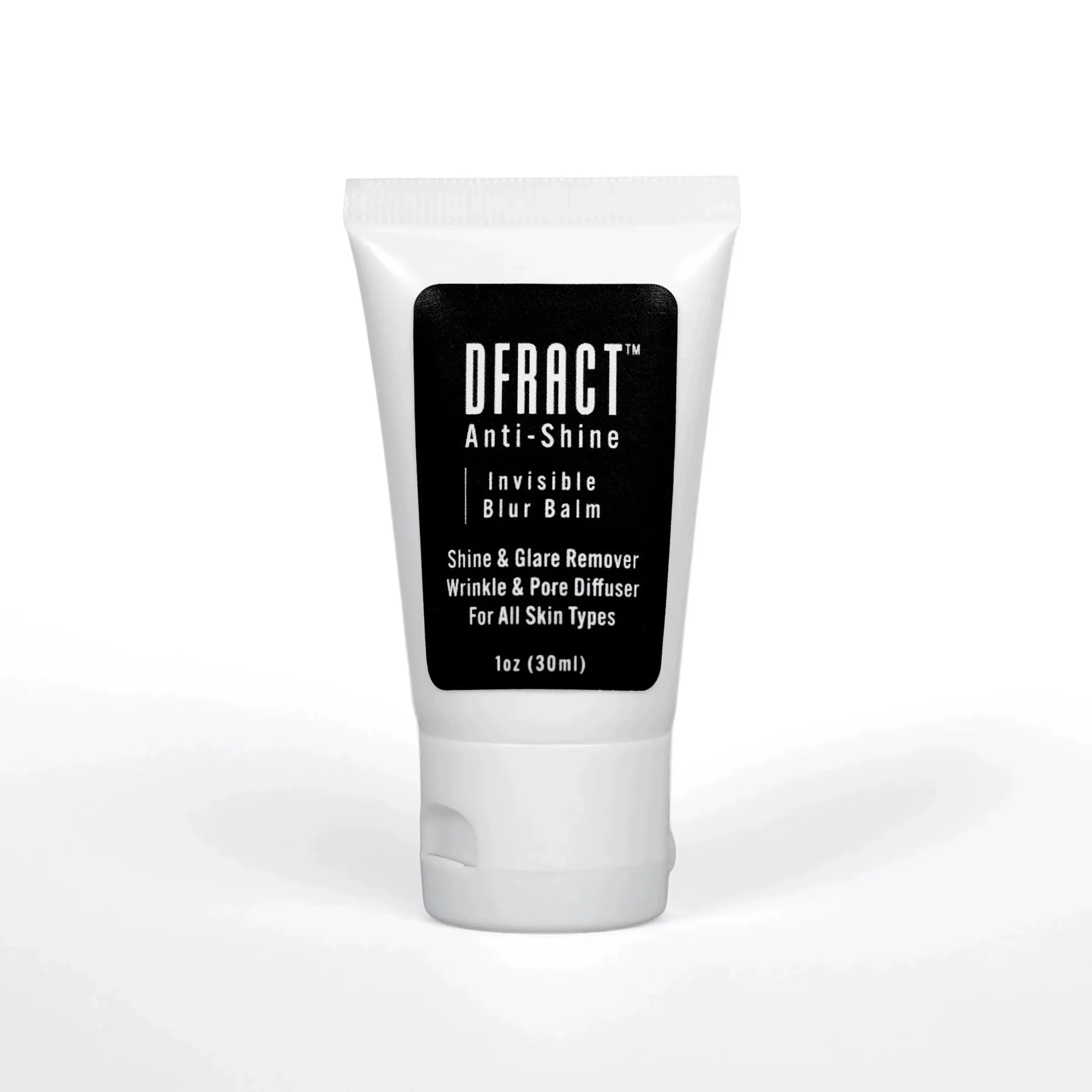 A tube of anti-shine by DFRACT. An invisible antishine blurring balm with white and black packaging.