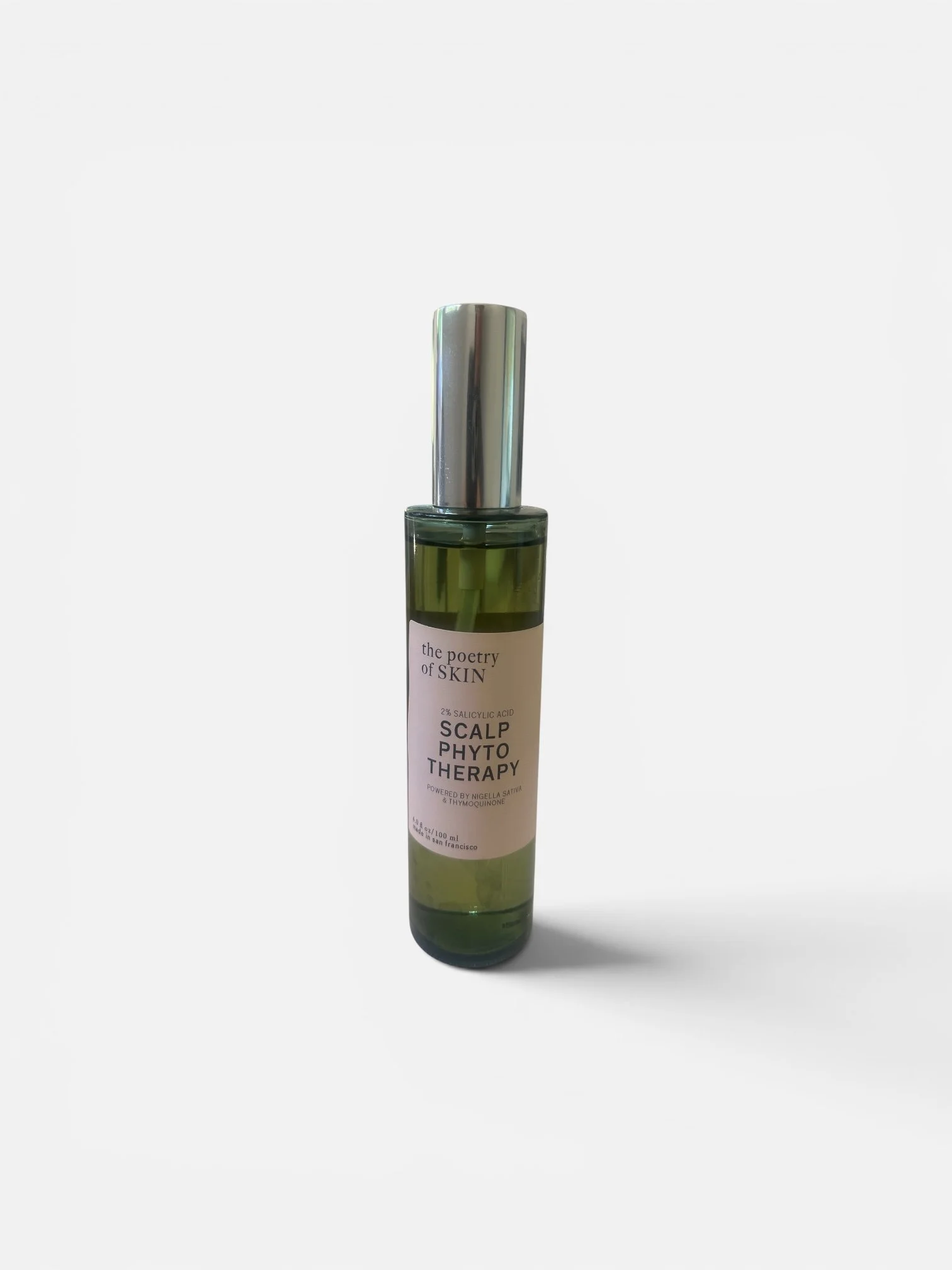 Two bottles of Phyto Scalp Therapy by Poetry of Skin on a clean grey background showing front and side label