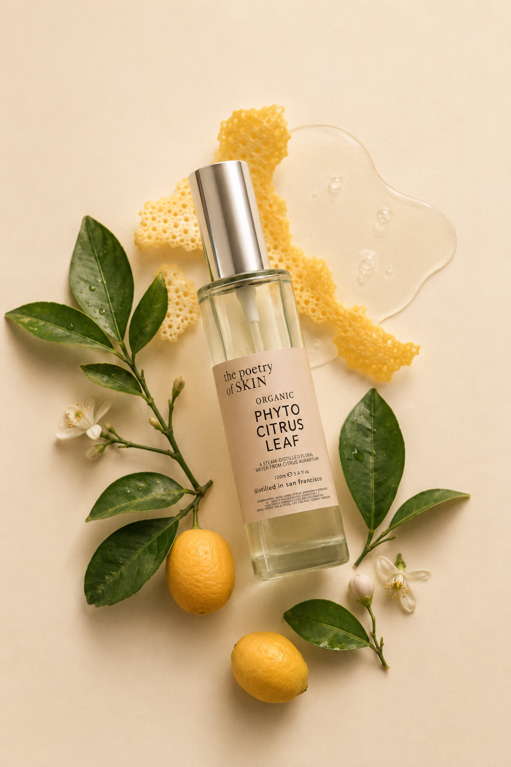 bottle on warm cream surface  Phyto Citrus Leaf Distillate by Poetry of Skin — glass spray bottle on soft neutral background, steam-distilled bitter orange leaf toner for all skin types