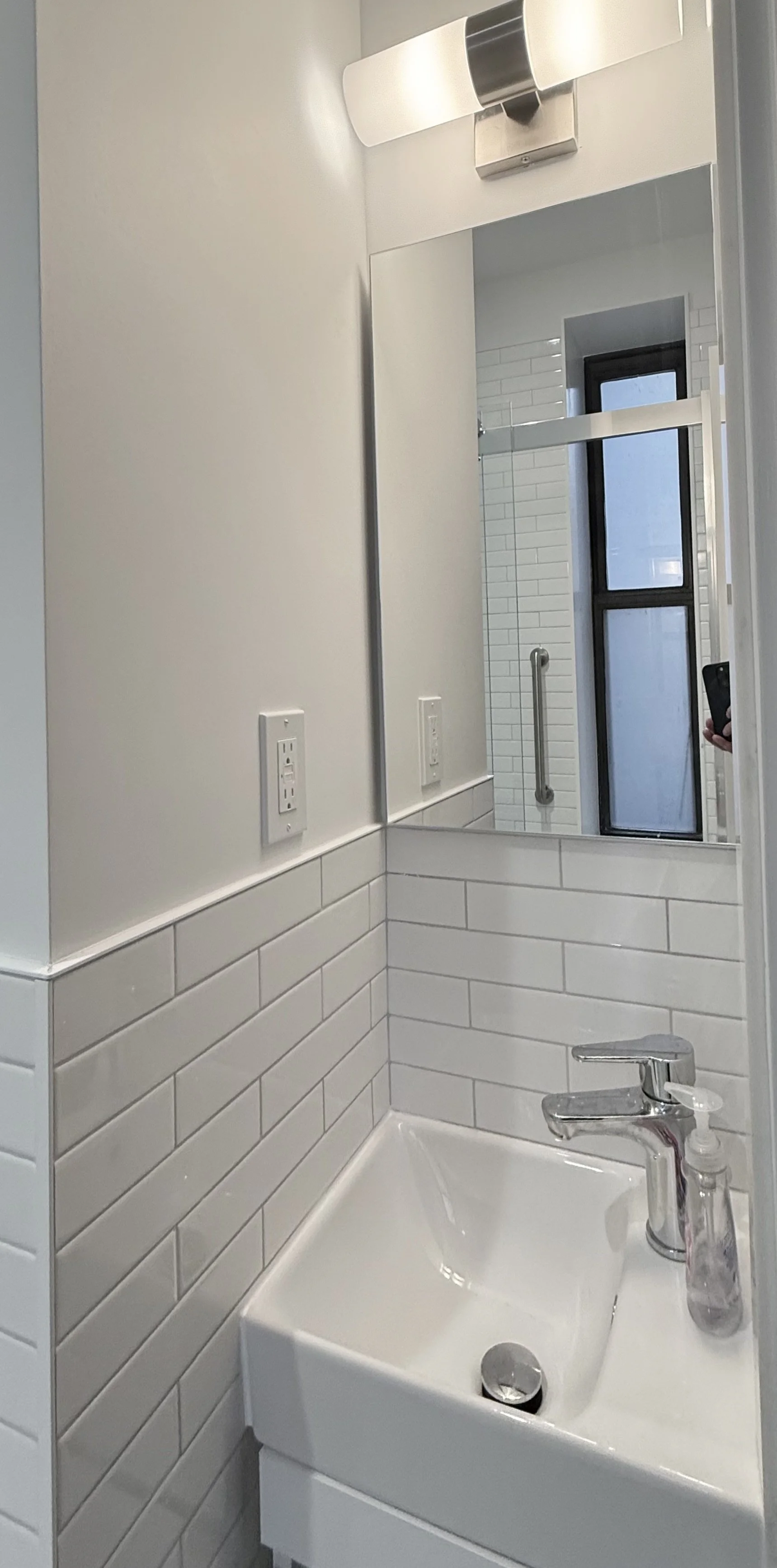 The tightest maid's room bathroom.