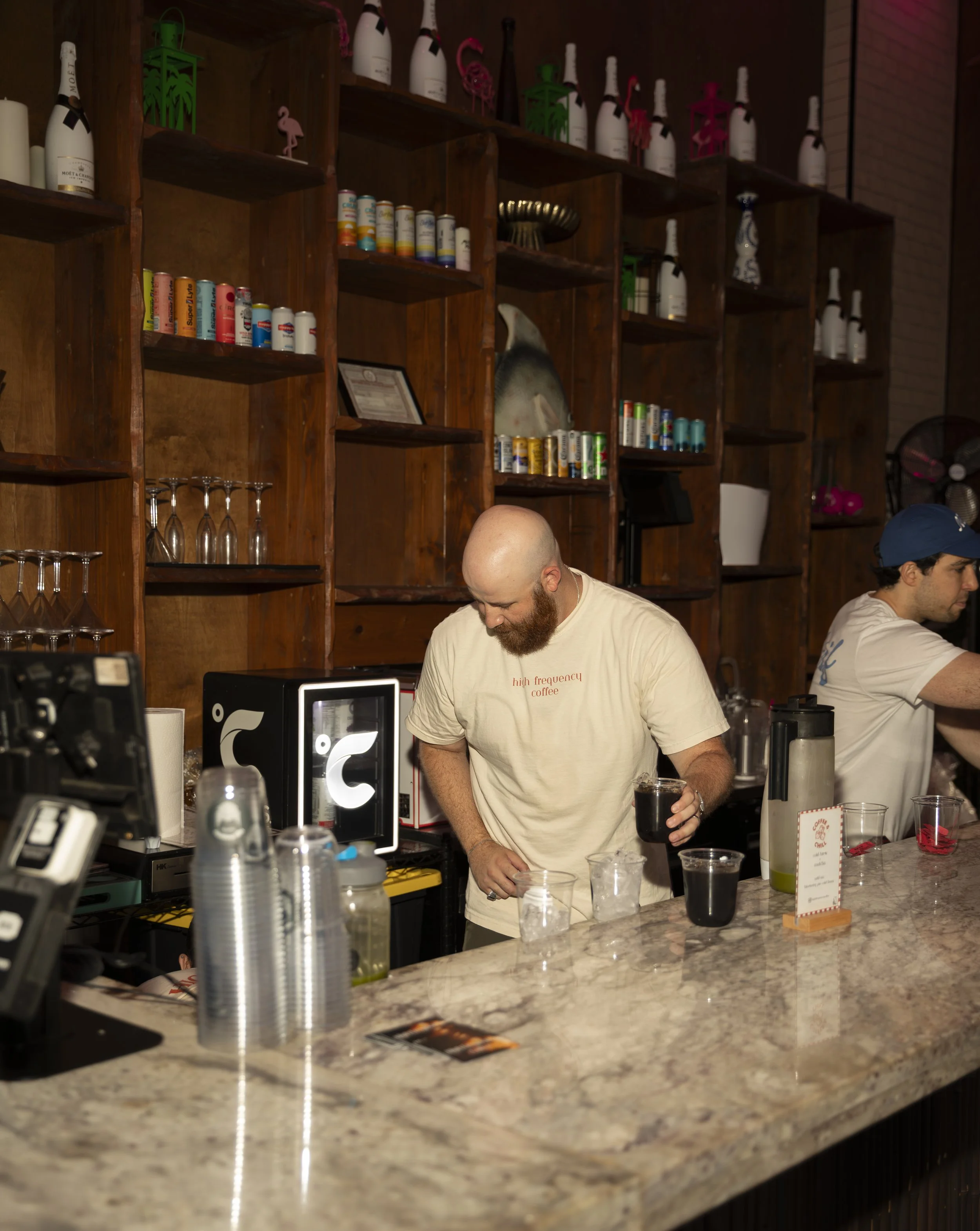 High Frequency Coffee event catering setup featuring a custom mobile coffee cart and specialty drink menu