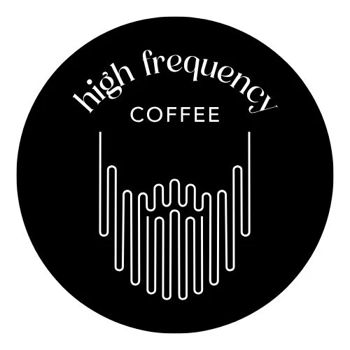 Logo with the words 'high frequency' curved above 'COFFEE' and a stylized sound wave design below.