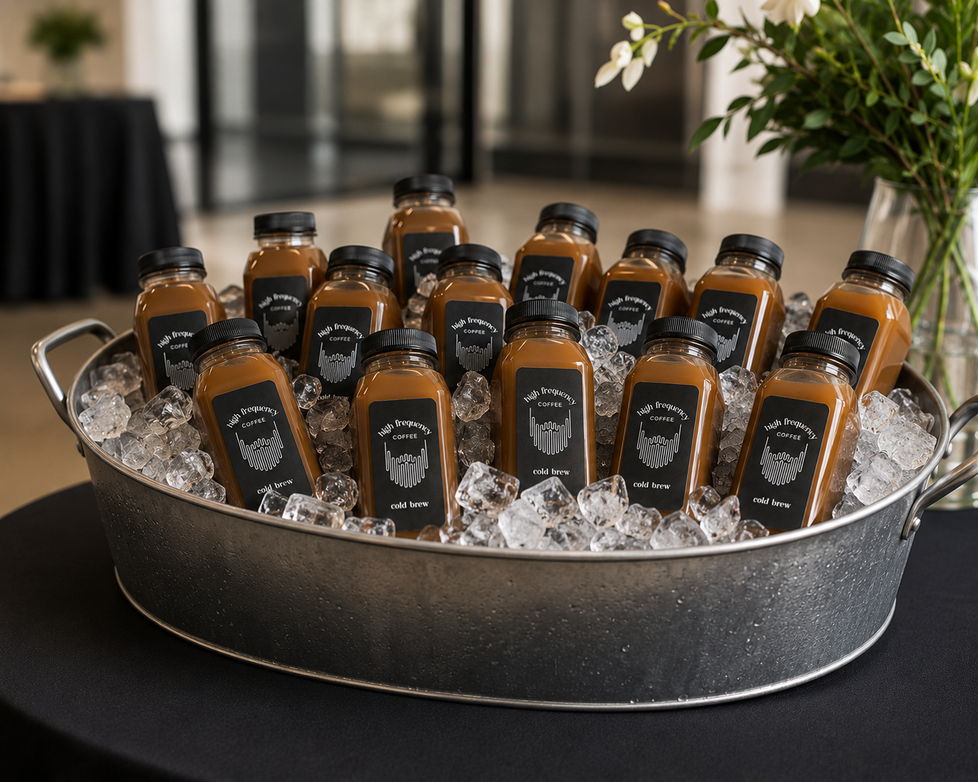 Bottled lattes being served as a grab-and-go option at a corporate event