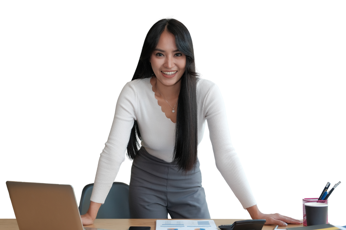 HR and Talent Strategy consultant standing at her desk smiling