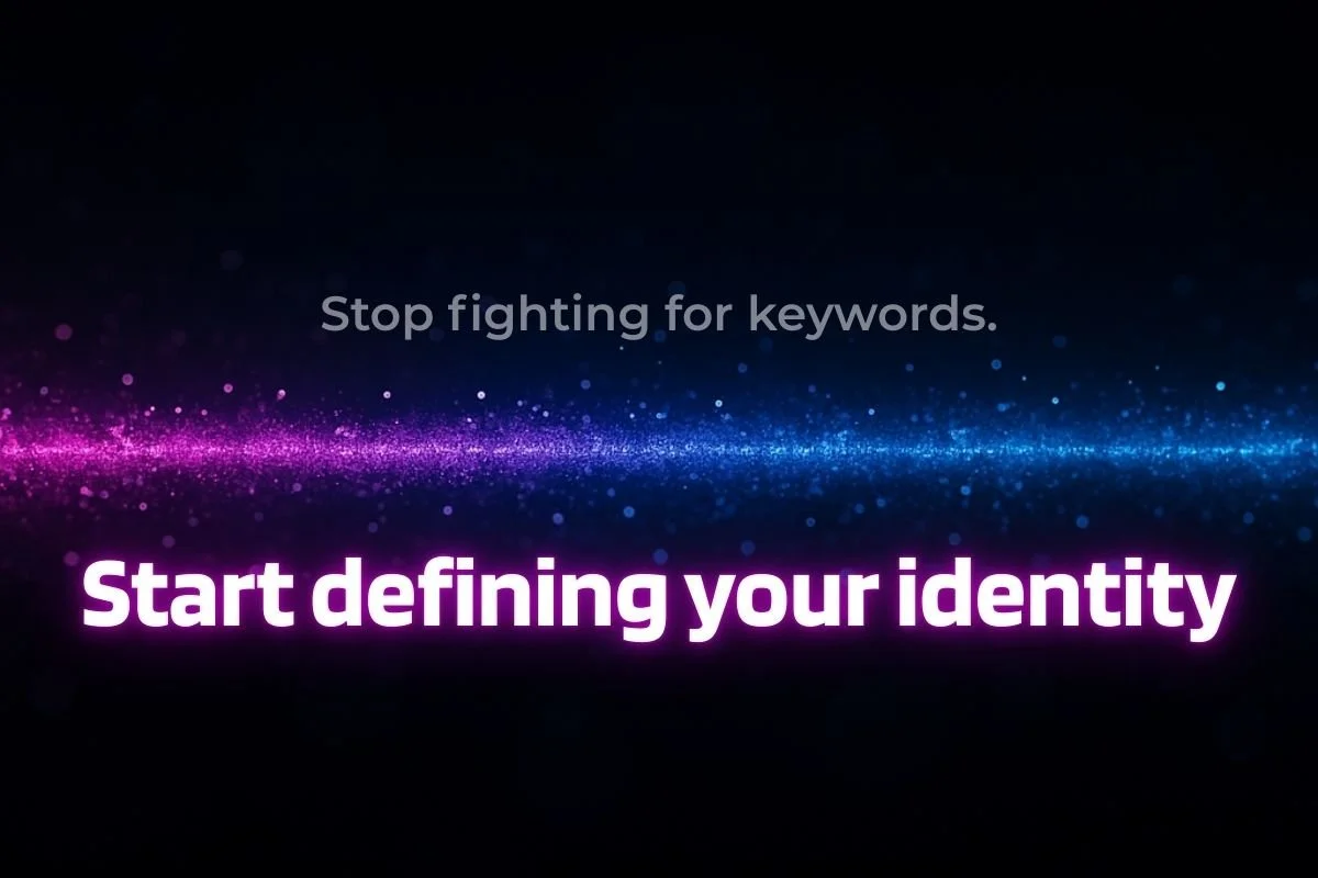 pixelated line through the middle of a dark background the top reads stop fighting for keywords the bottom reads start defining your identity