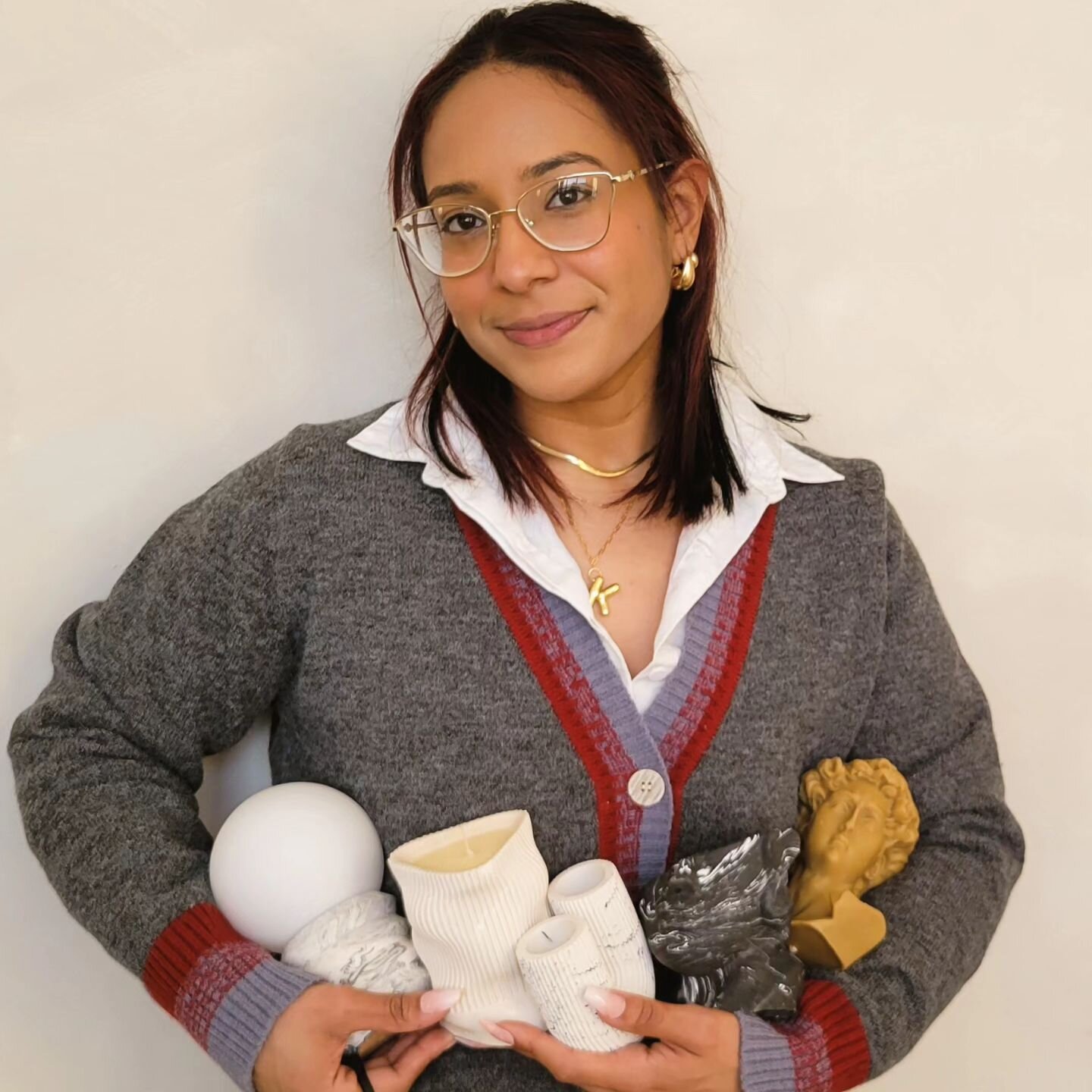 Owner of S&amp;H Keslie is pictured with her favorite pieces. All that's missing is the classic Teddy candle (he's off at college 😔)

&quot;I'm four years in, and every piece I pull out of a mold, or every whiff of my candle recipes and I still get 