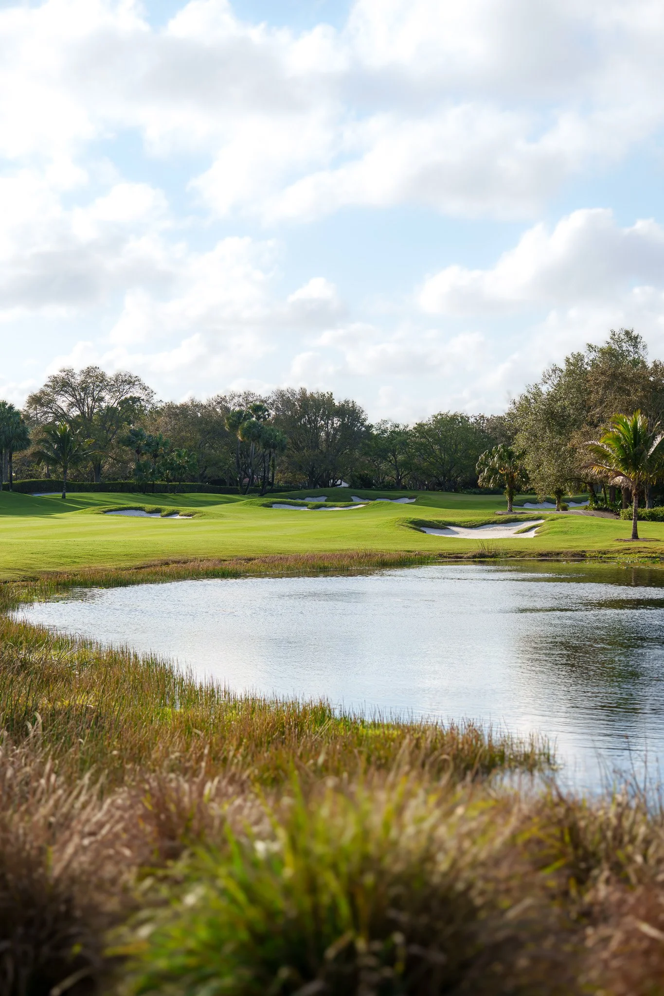 South Florida golf course with water hazard and sand bunkers — country club and hospitality photography by Fort Lauderdale photographer Adam J Tanner