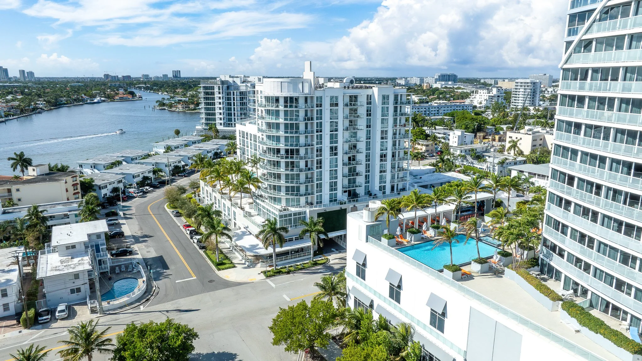 Aerial photograph of a South Florida beachfront hotel with rooftop pool and ocean views