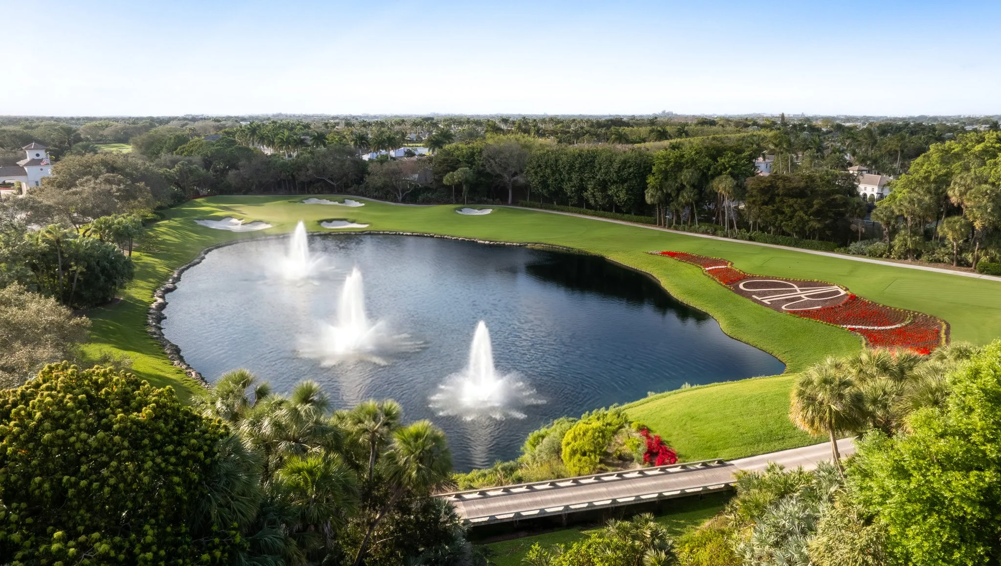 South Florida private country club golf course with decorative flower bed and fountains — hospitality and club photography by Fort Lauderdale photographer Adam J Tanner