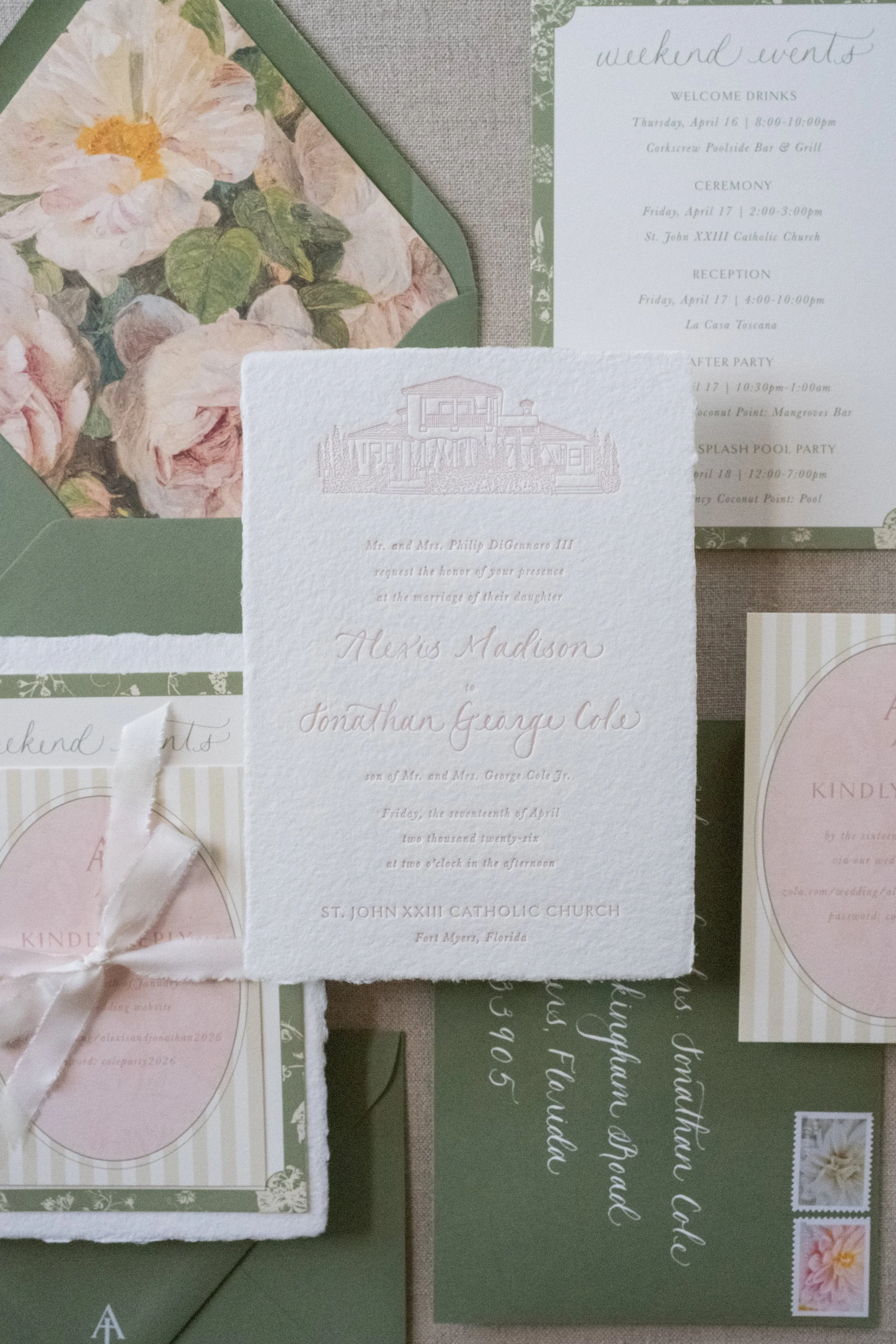 Handmade paper wedding invitation with a letterpress print and venue illustration
