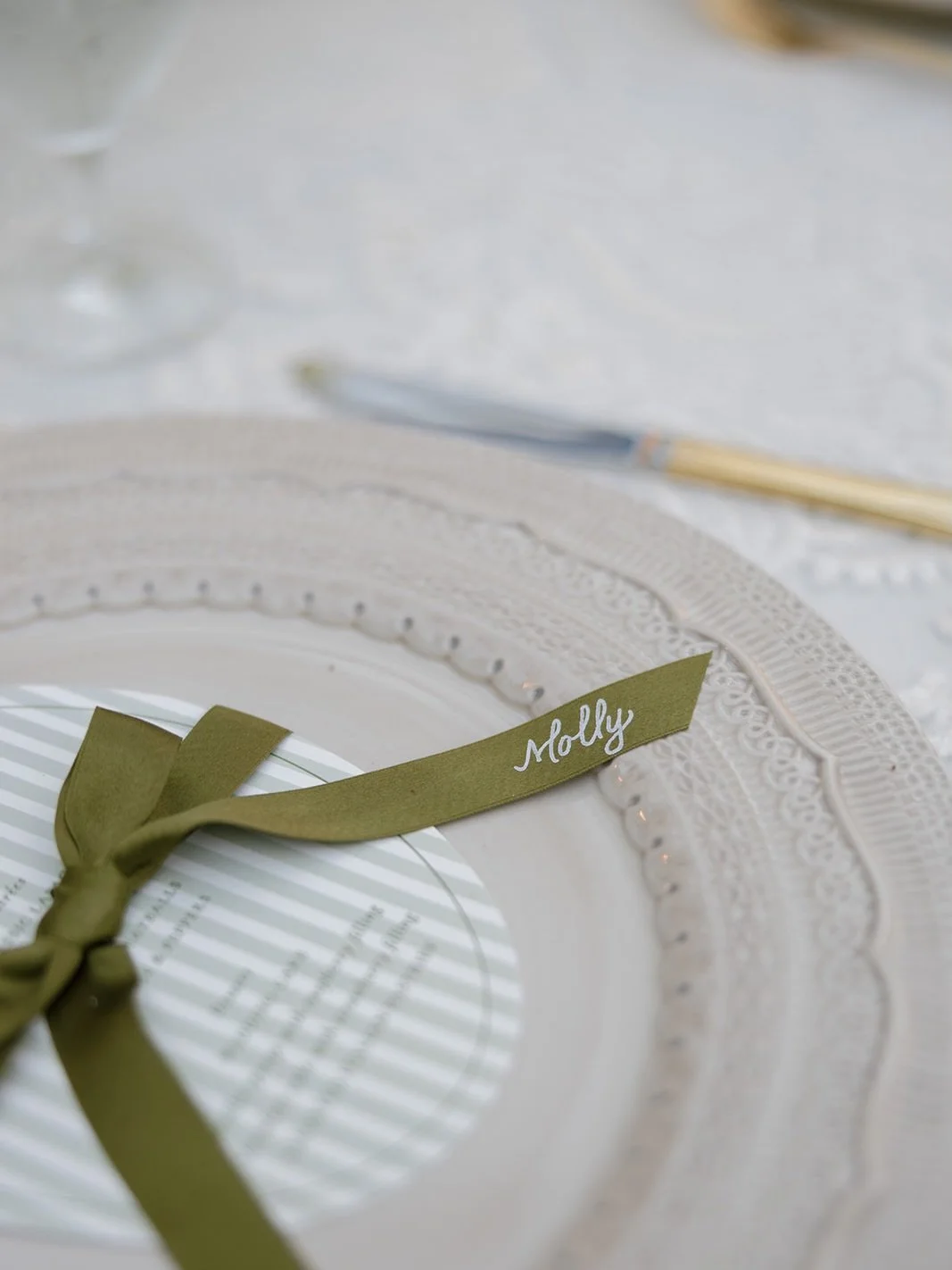 Satin ribbon place cards for E&amp;K - these aren&rsquo;t printed, they&rsquo;re hand written. My calligraphy hot foiled onto each individual strand, tied onto the menu cards and displayed at each place setting. A true labor of love that was well wor