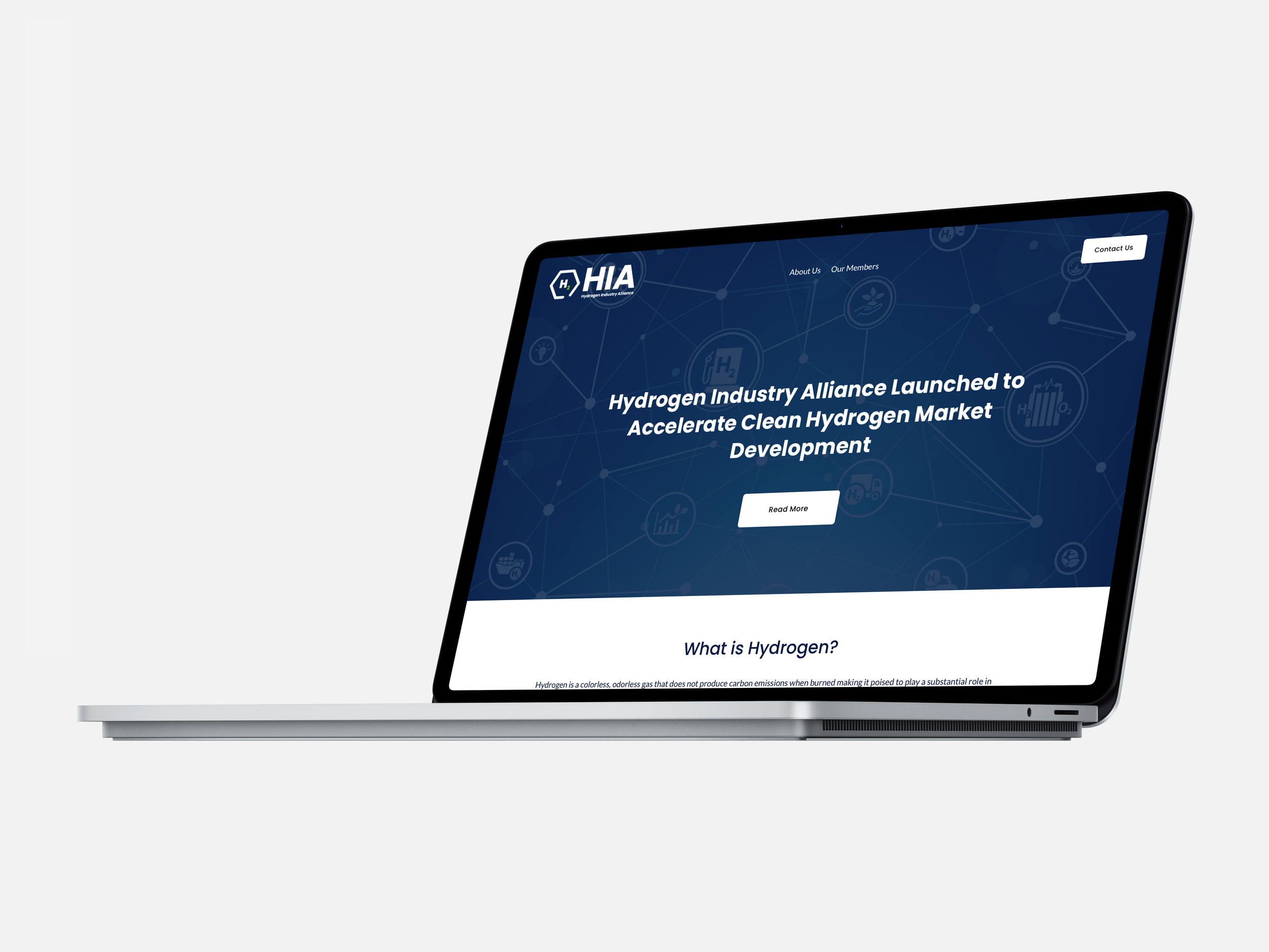 Laptop mockup displaying the Hydrogen Industry Alliance website homepage
