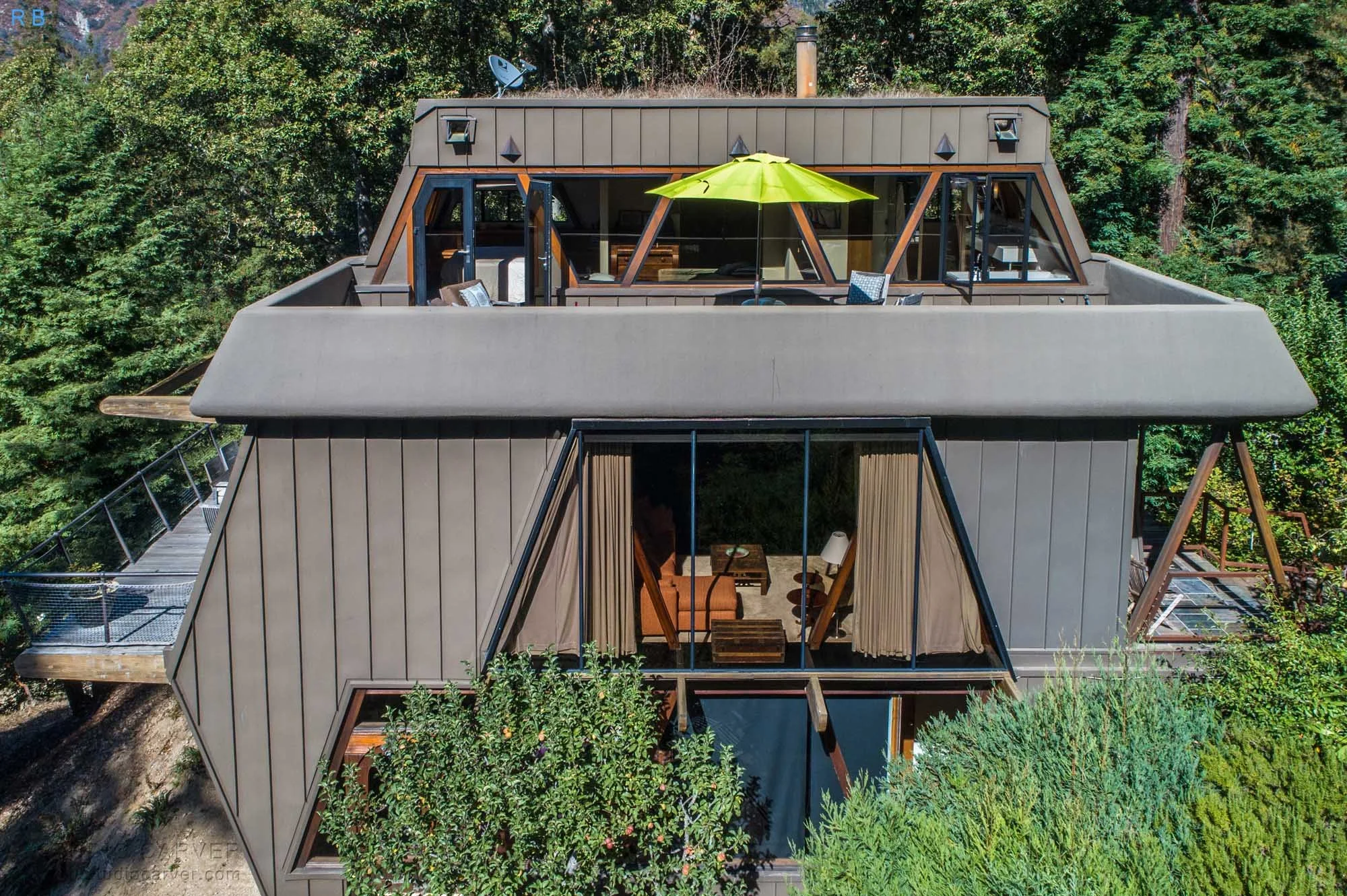 Advanced Retreat in Big Sur: A 3-Story Wooden Oasis. Sustainable Design, Ocean Views, and Sun-Drenched Patios in 2,405 SF of Tranquility.