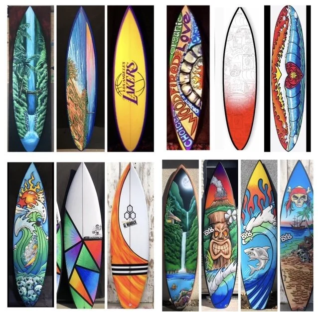 Collection of 13 surfboards with various colorful and artistic designs.