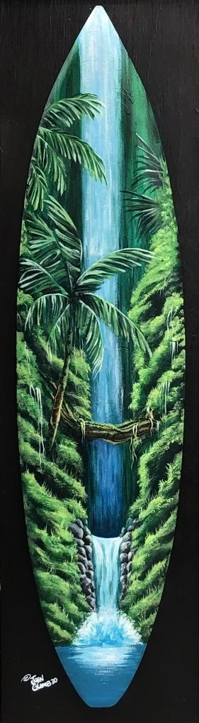Hand-painted surfboard featuring a lush jungle scene with a waterfall and green foliage.