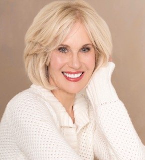 Headshot White sweater Most recent FAVORITE.jpg